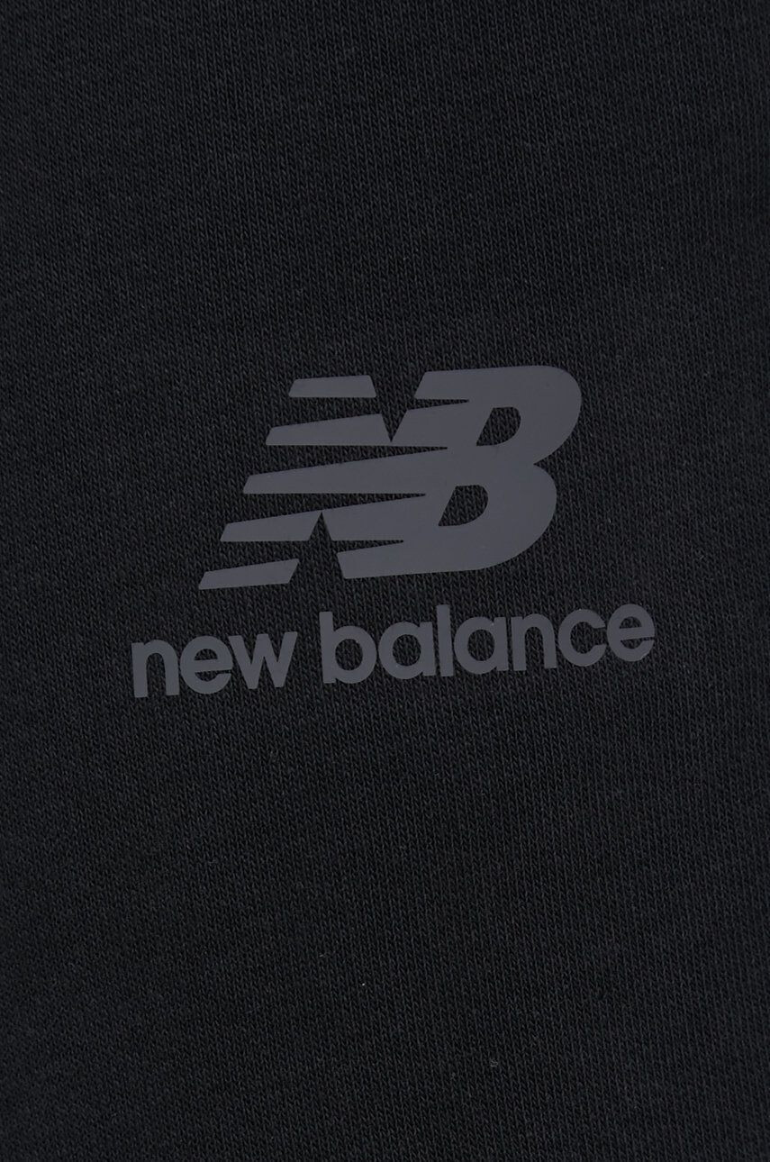 New Balance Spodnji del trenirke moški črna barva - Pepit.si