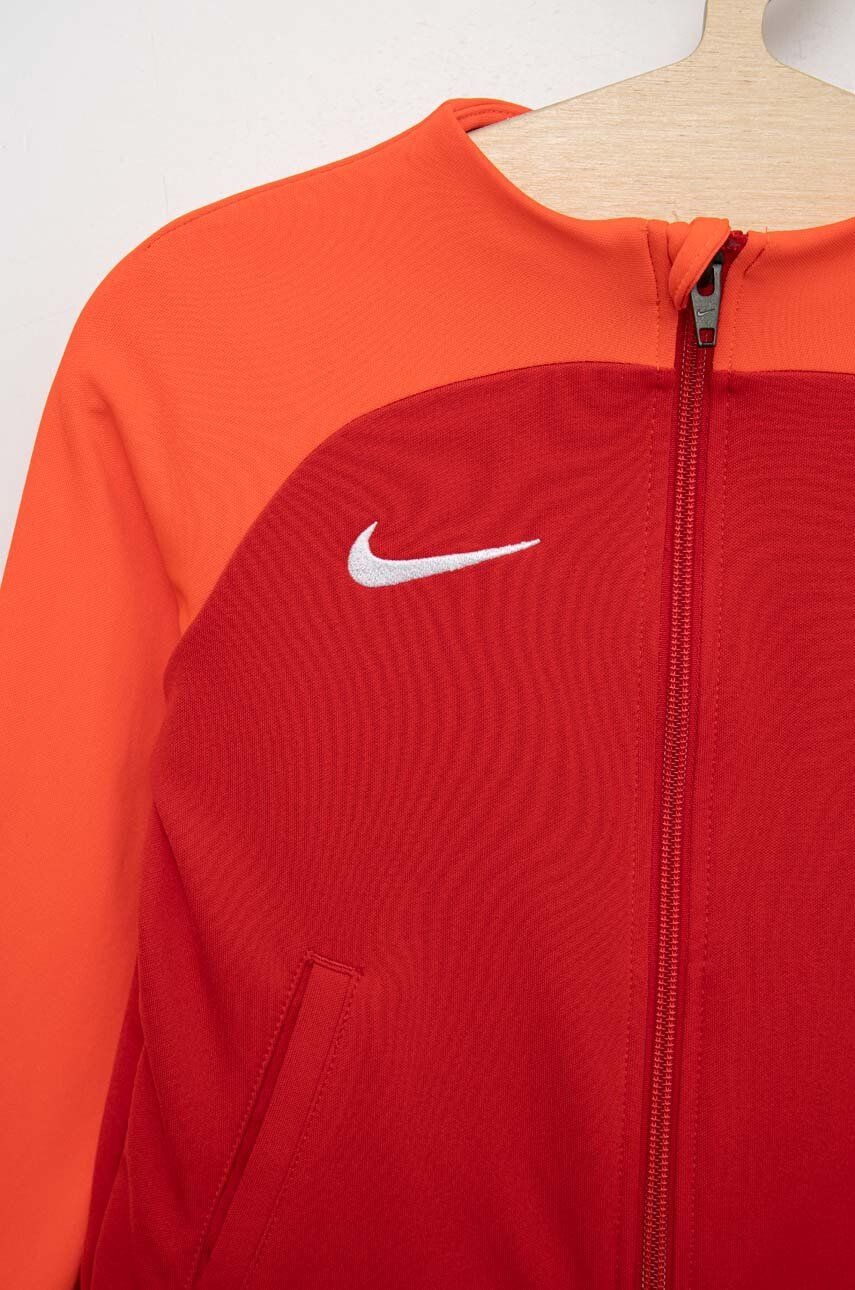 Nike Otroška trenirka rdeča barva - Pepit.si