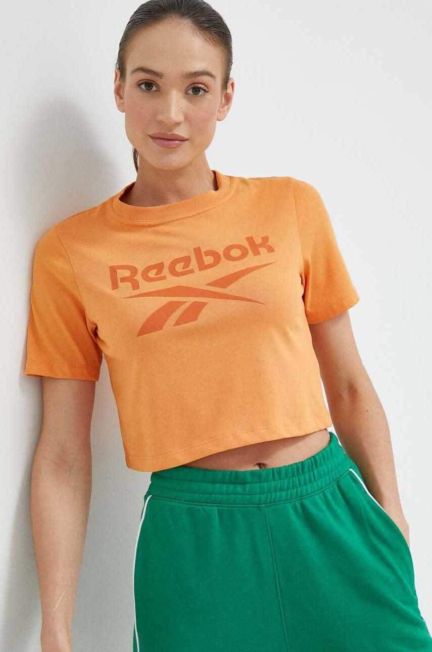 Reebok Kratka majica ženski oranžna barva - Pepit.si