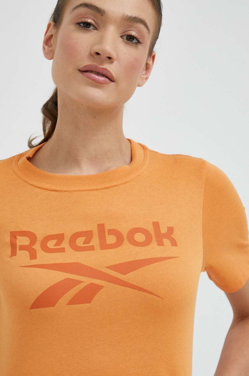 Reebok Kratka majica ženski oranžna barva - Pepit.si