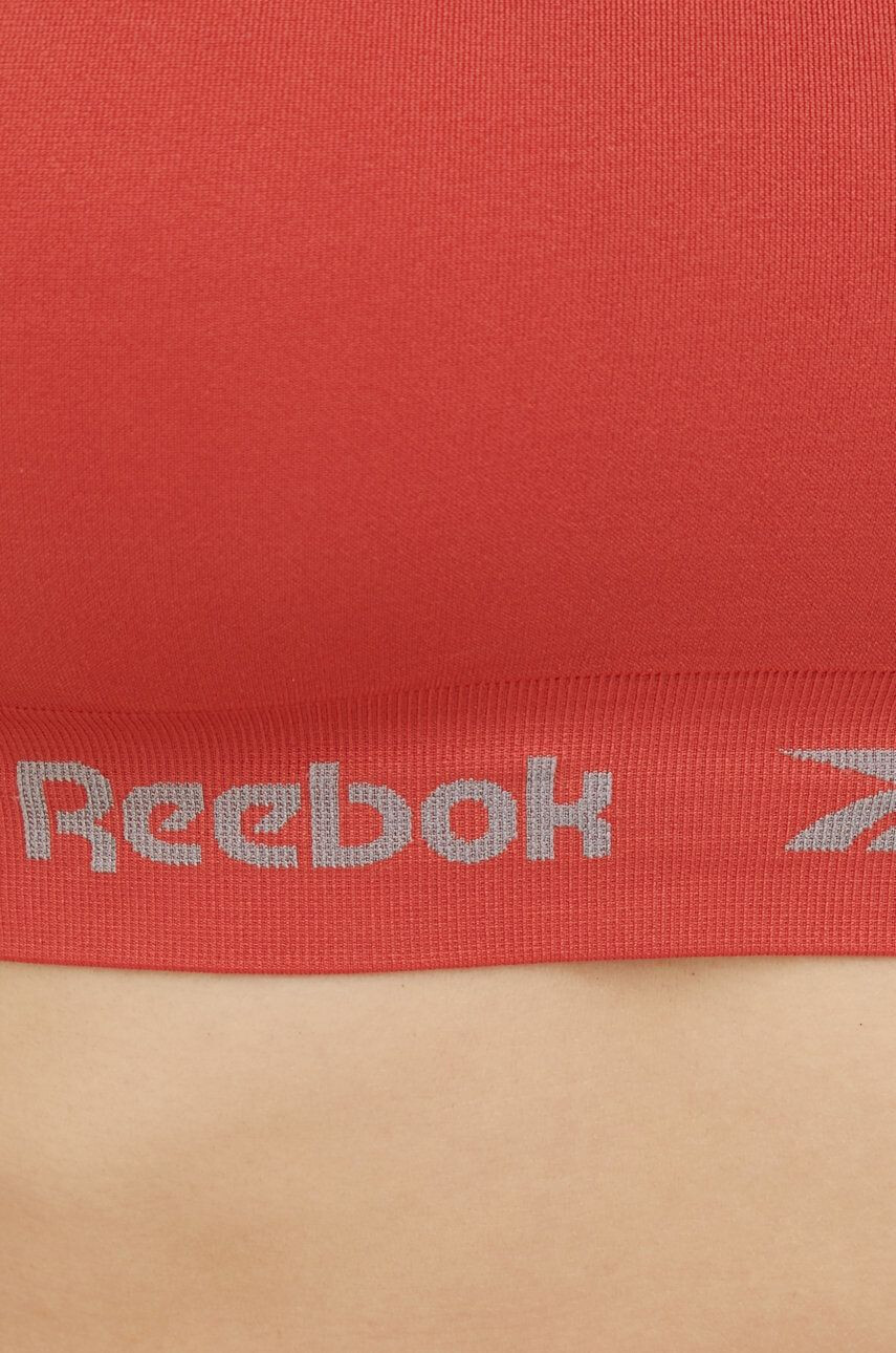 Reebok Športni modrček Jenna oranžna barva - Pepit.si