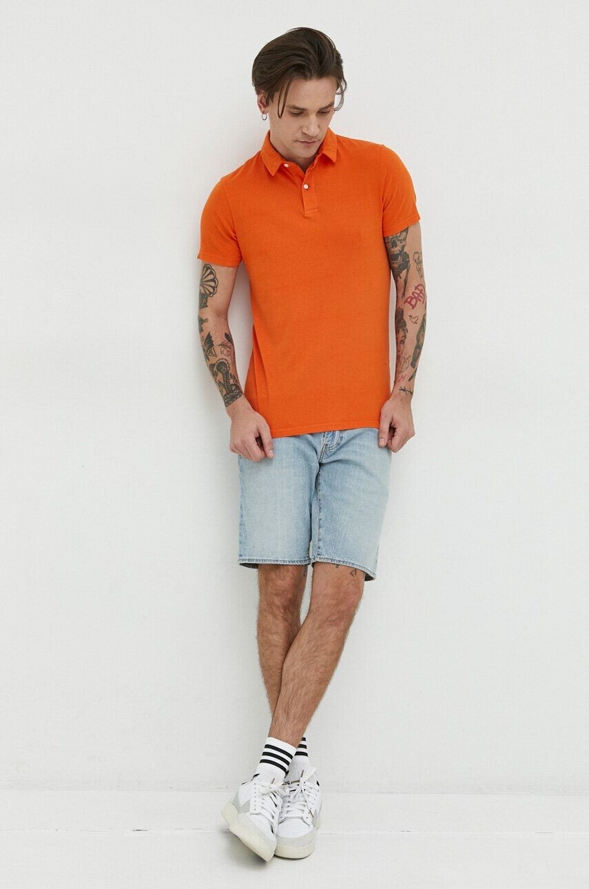 Superdry Bombažen polo oranžna barva - Pepit.si