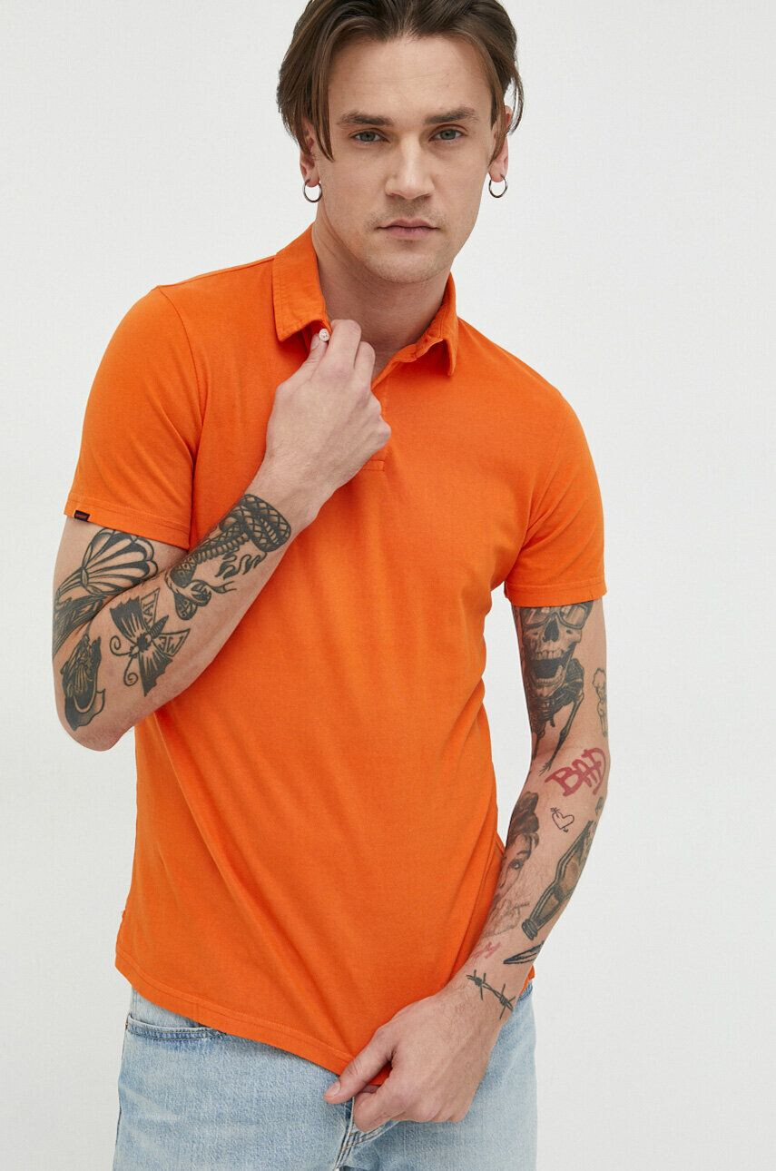 Superdry Bombažen polo oranžna barva - Pepit.si