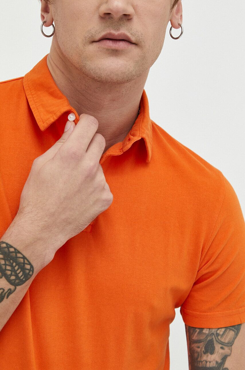 Superdry Bombažen polo oranžna barva - Pepit.si