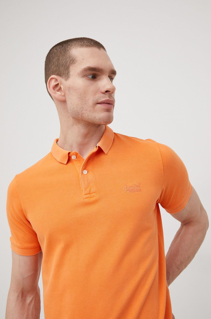 Superdry Bombažen polo oranžna barva - Pepit.si