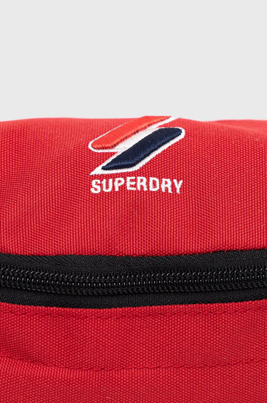 Superdry Pasna torbica rdeča barva - Pepit.si