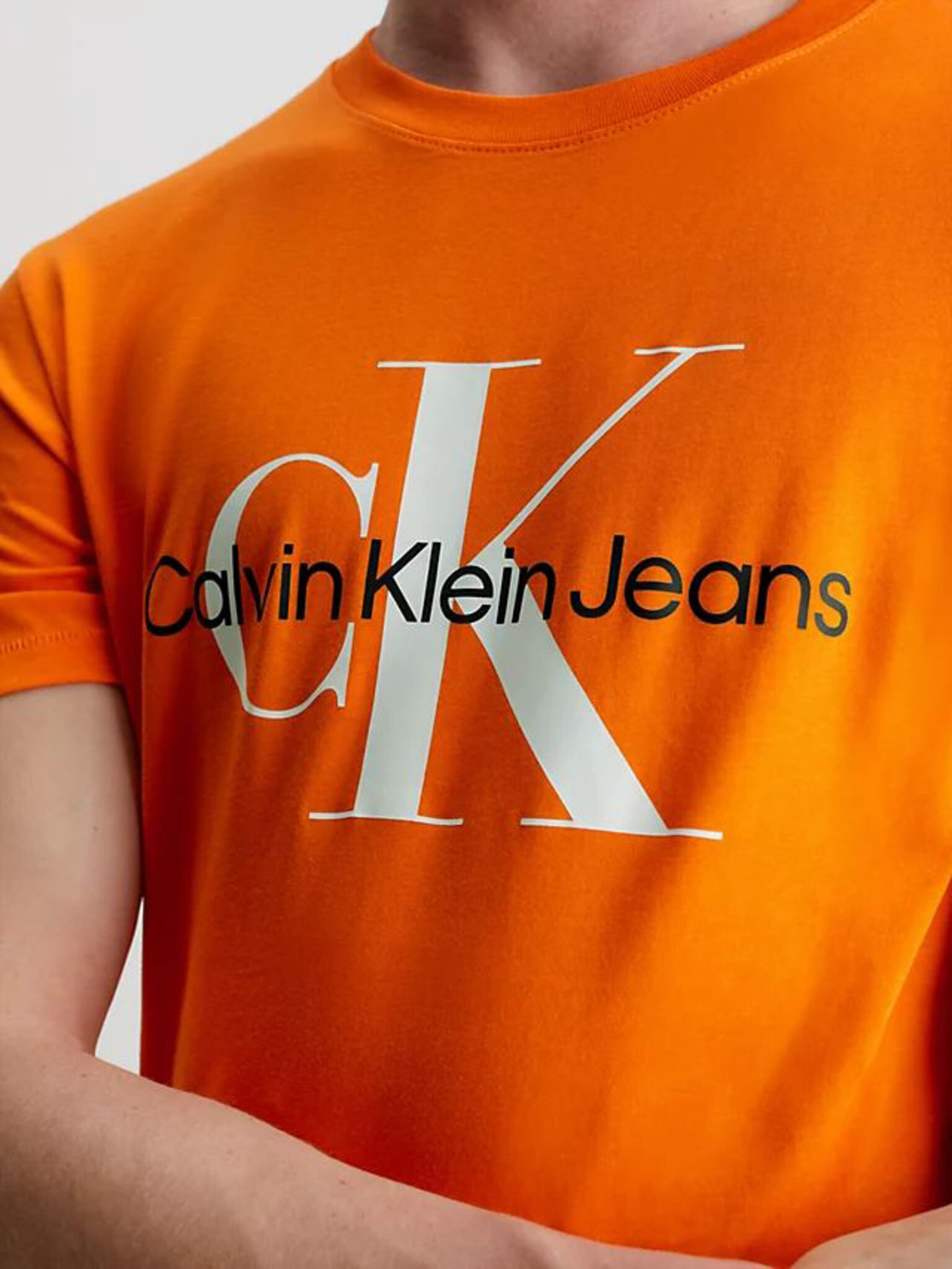 Calvin Klein Jeans Majica Oranžna - Pepit.si