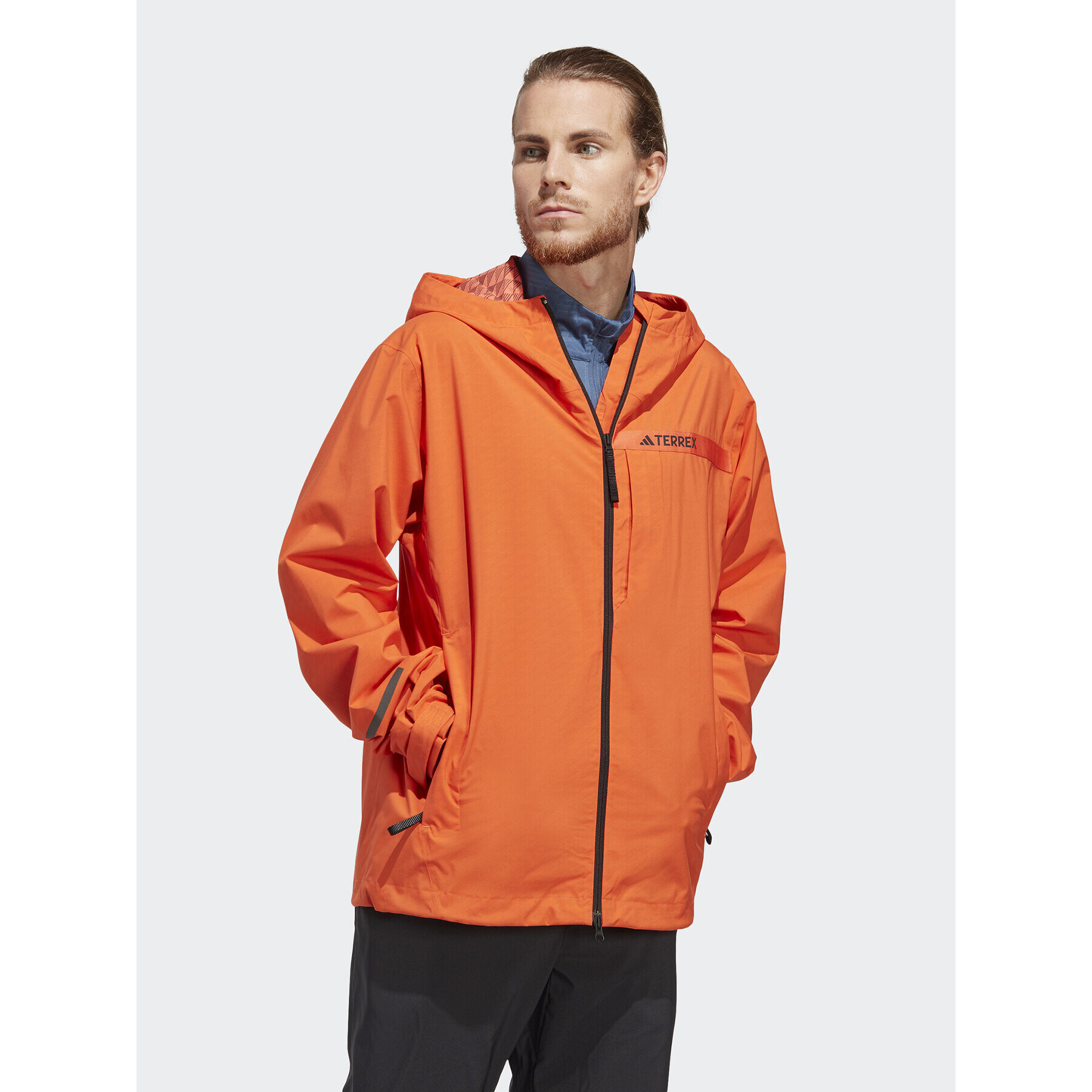 adidas Dežna jakna Terrex Multi RAIN.RDY HM4052 Oranžna Regular Fit - Pepit.si