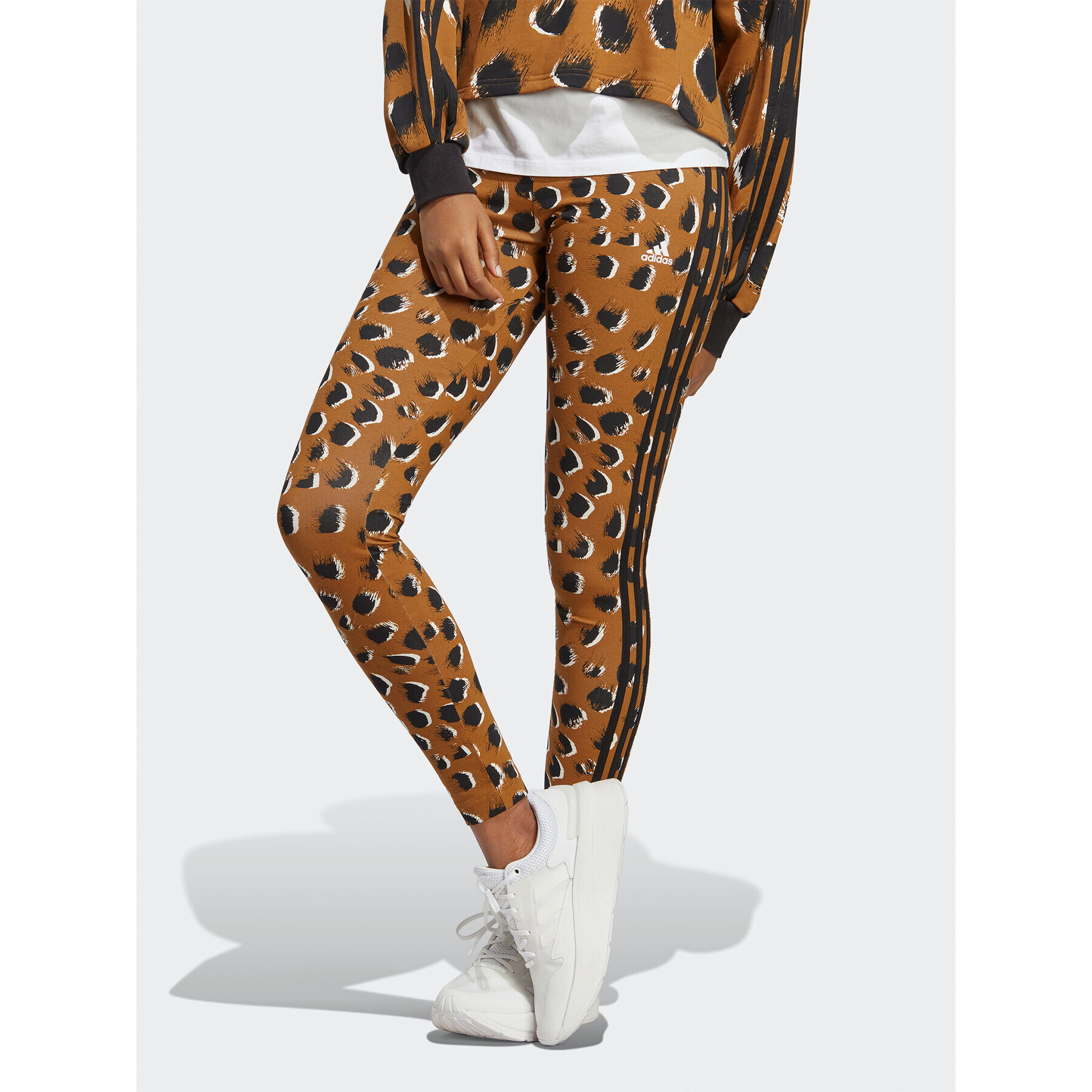 adidas Sportswear adidas Pajkice Essentials 3-Stripes Animal Print Leggings IC8691 Rjava - Pepit.si