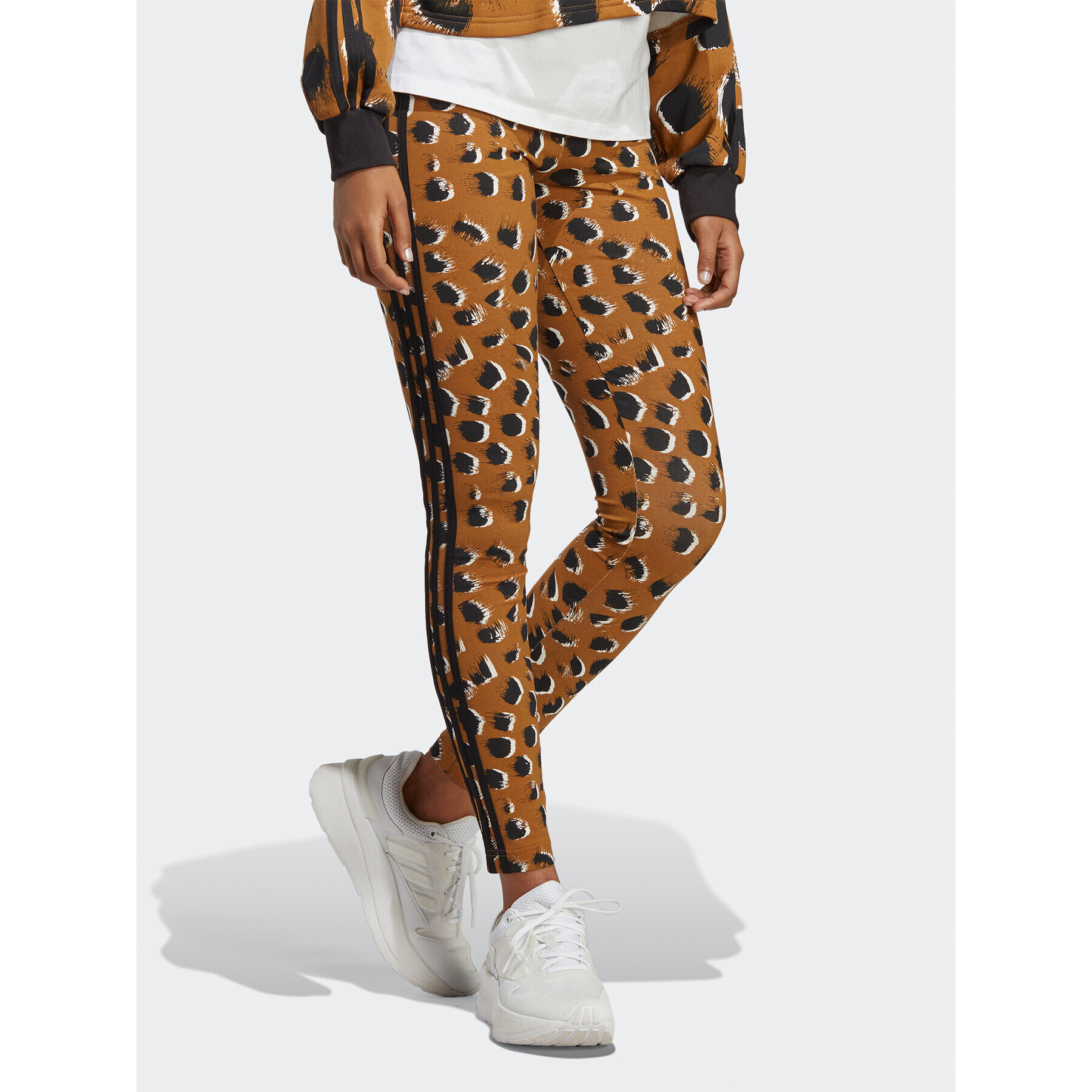 adidas Sportswear adidas Pajkice Essentials 3-Stripes Animal Print Leggings IC8691 Rjava - Pepit.si