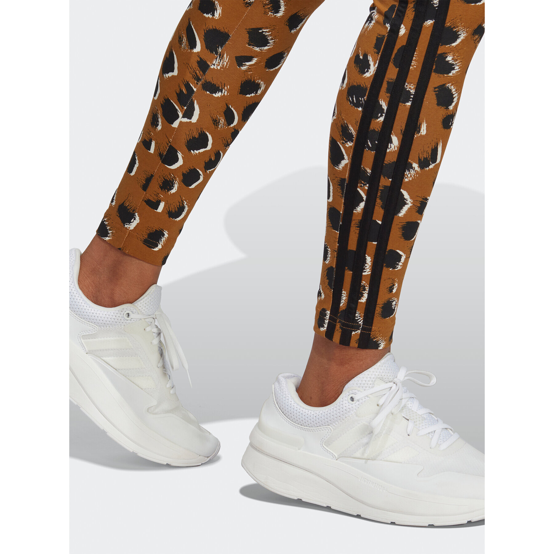 adidas Sportswear adidas Pajkice Essentials 3-Stripes Animal Print Leggings IC8691 Rjava - Pepit.si