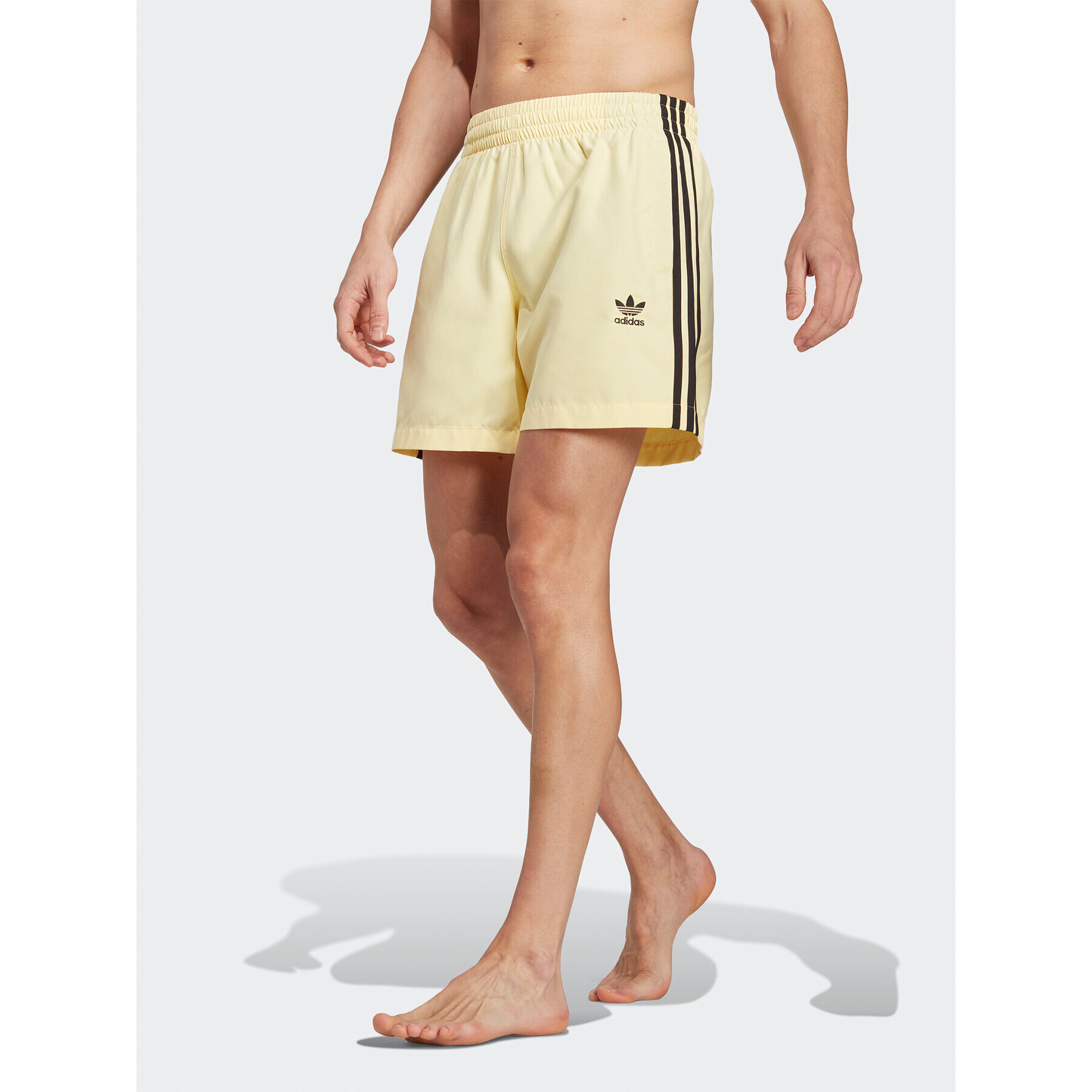 adidas Kopalne hlače Originals Adicolor 3-Stripes Swim Shorts HT4410 Rumena Regular Fit - Pepit.si