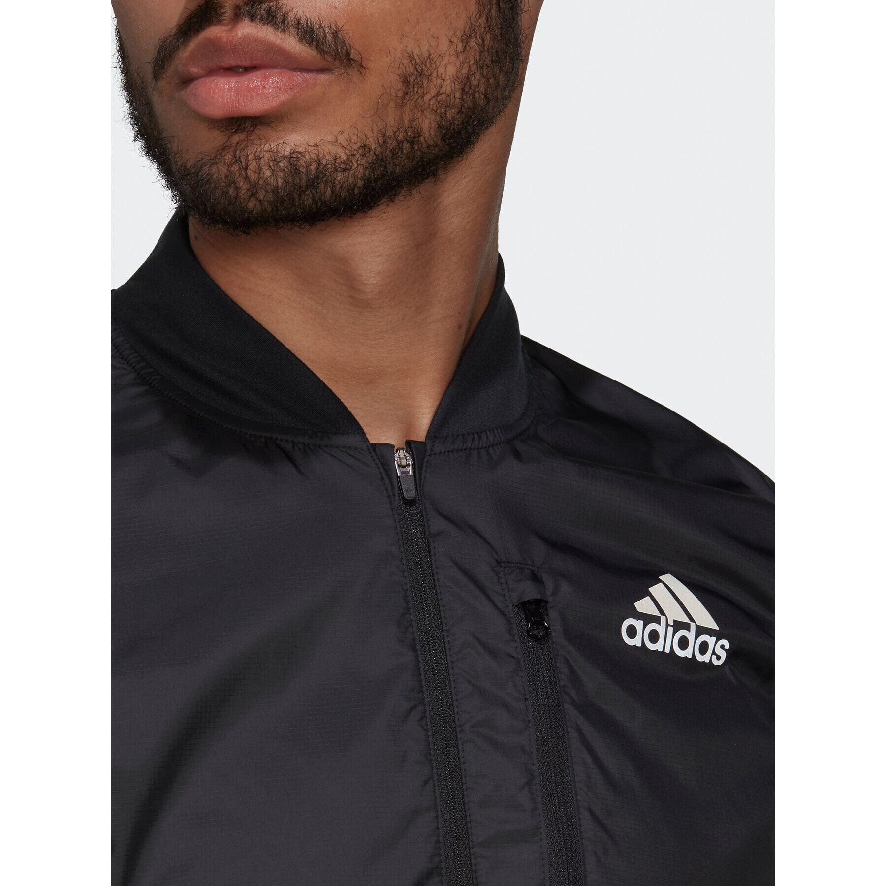 adidas Telovnik Own The Run Vest HL3926 Črna Slim Fit - Pepit.si