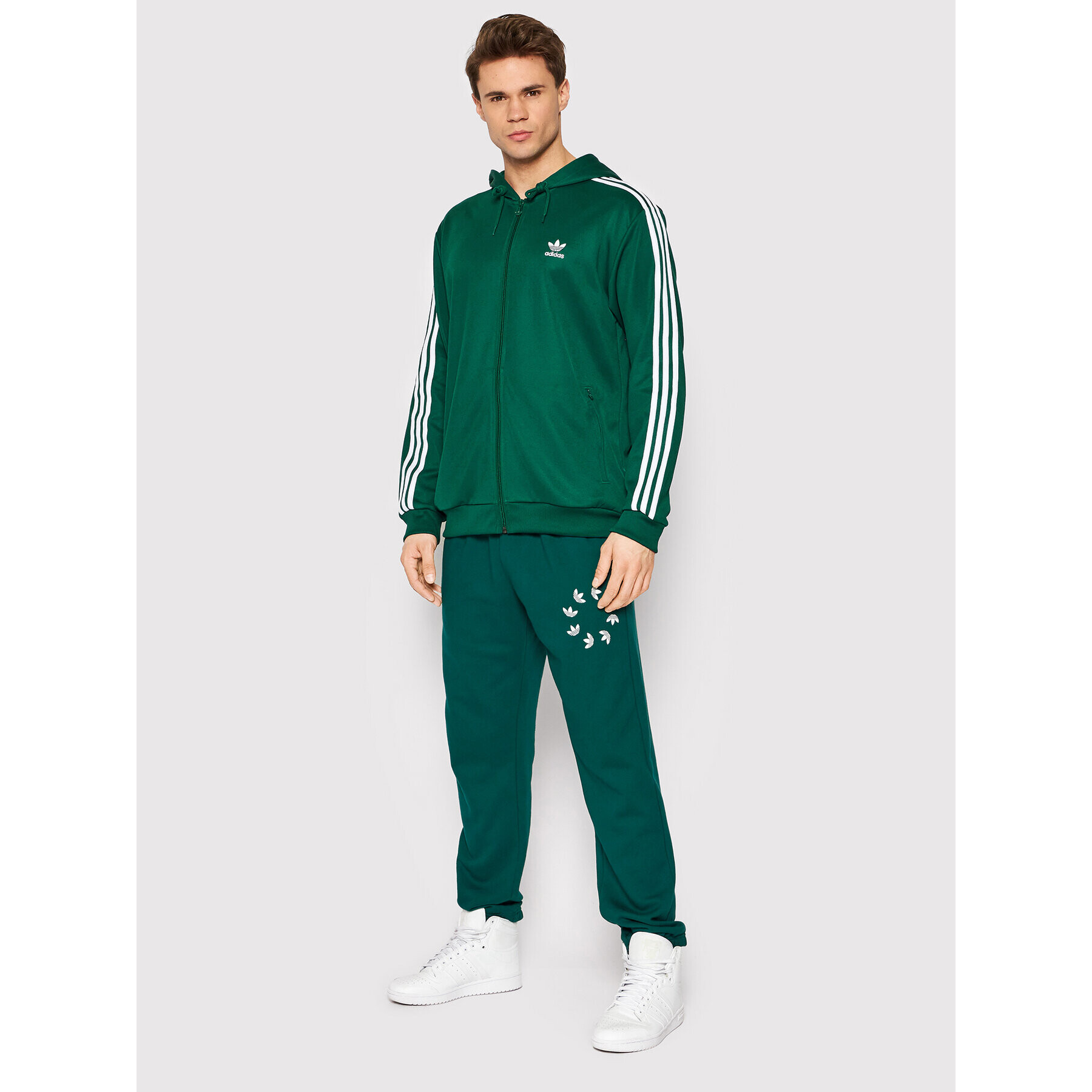 adidas Spodnji del trenirke adicolor Spinner HC4494 Zelena Regular Fit - Pepit.si