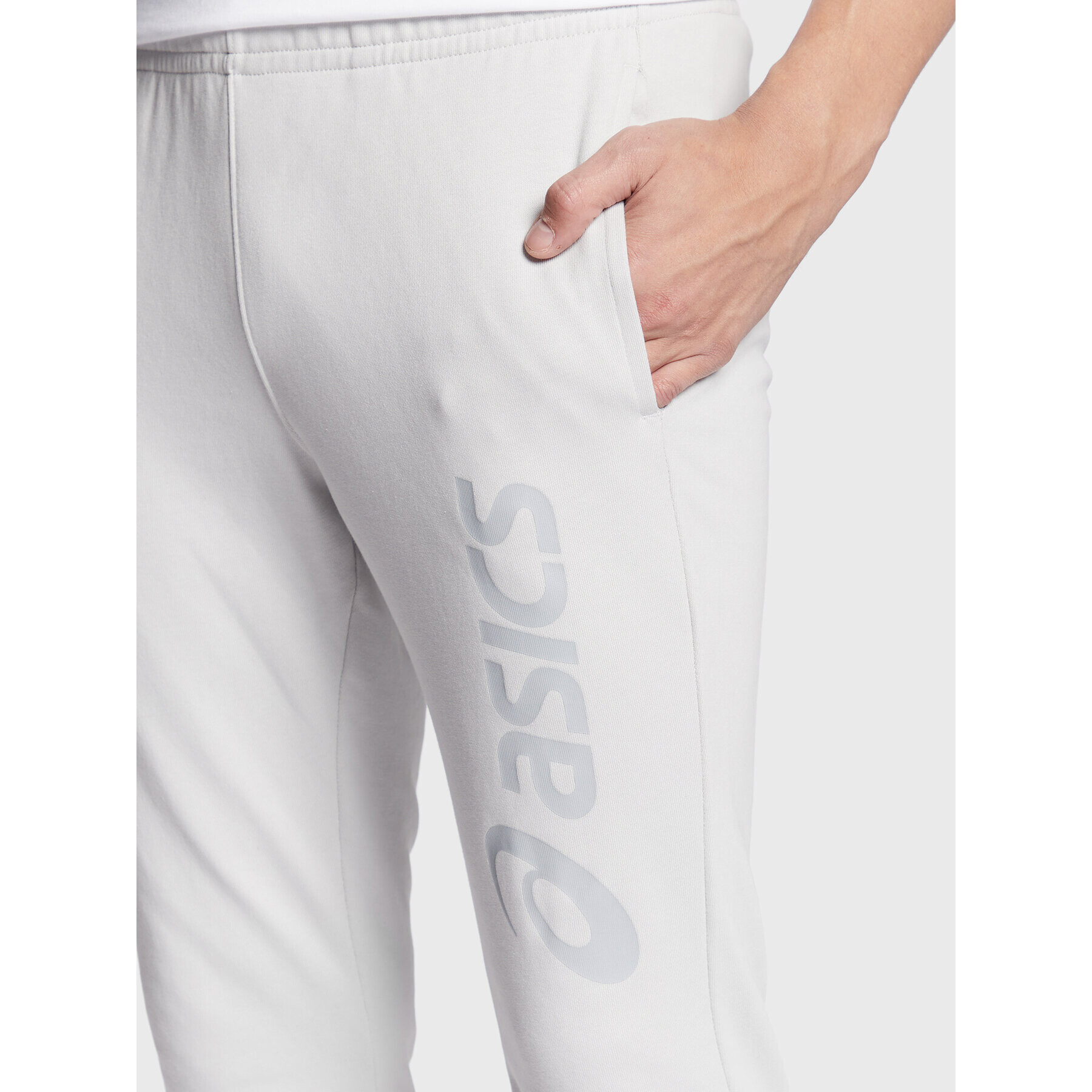 Asics Spodnji del trenirke Big Logo 2031A977 Siva Slim Fit - Pepit.si