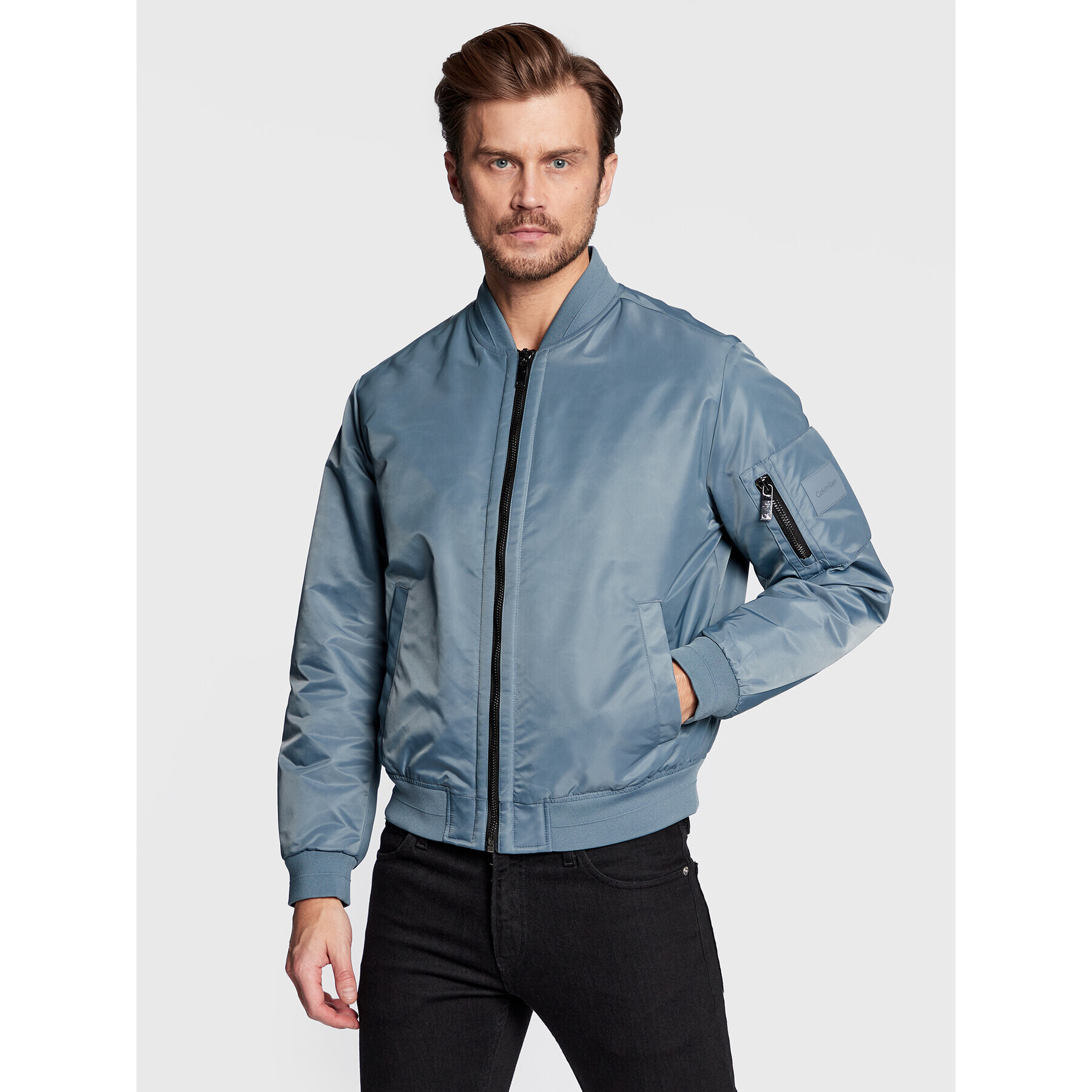 Calvin Klein Bomber jakna Hero K10K109907 Modra Relaxed Fit - Pepit.si