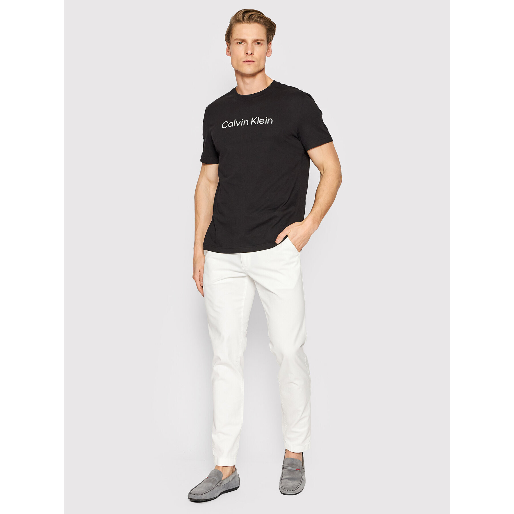 Calvin Klein Chino hlače Garment Dye K10K109456 Bela Slim Fit - Pepit.si