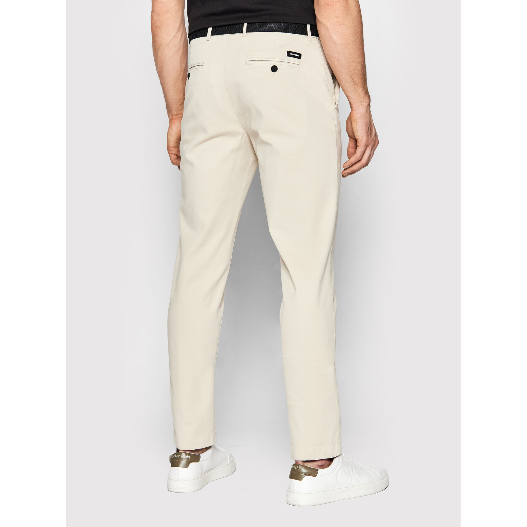 Calvin Klein Chino hlače Garment Dye K10K109456 Bež Slim Fit - Pepit.si