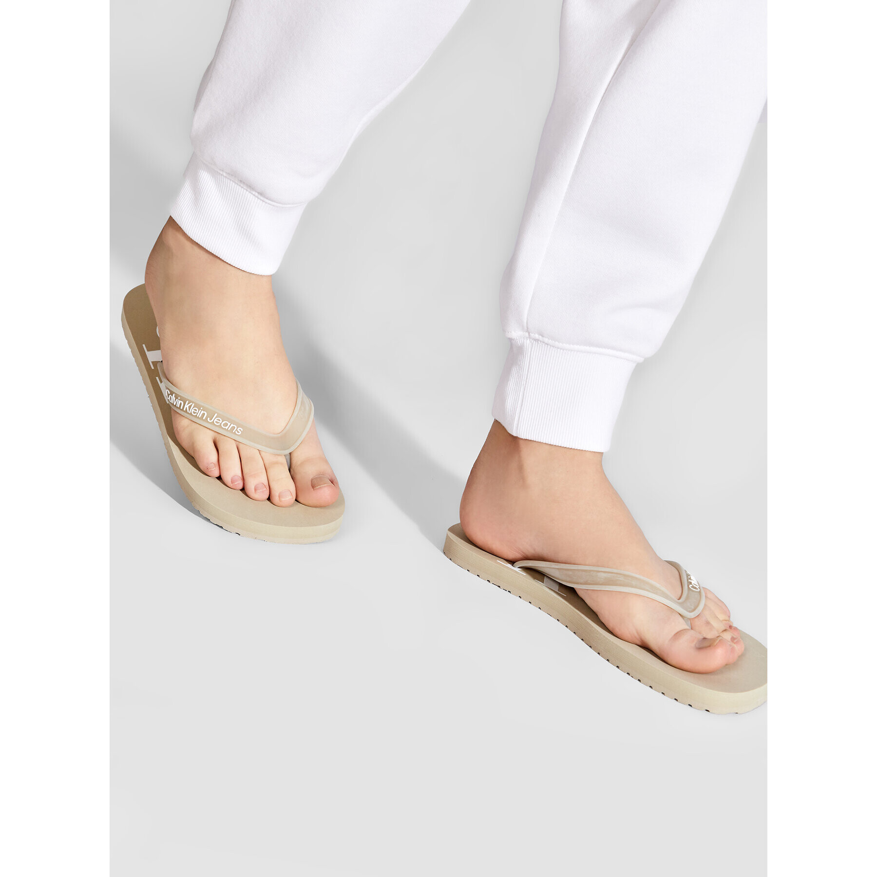 Calvin Klein Jeans Japonke Beach Sandal Monogram Tpu YM0YM00055 Bež - Pepit.si