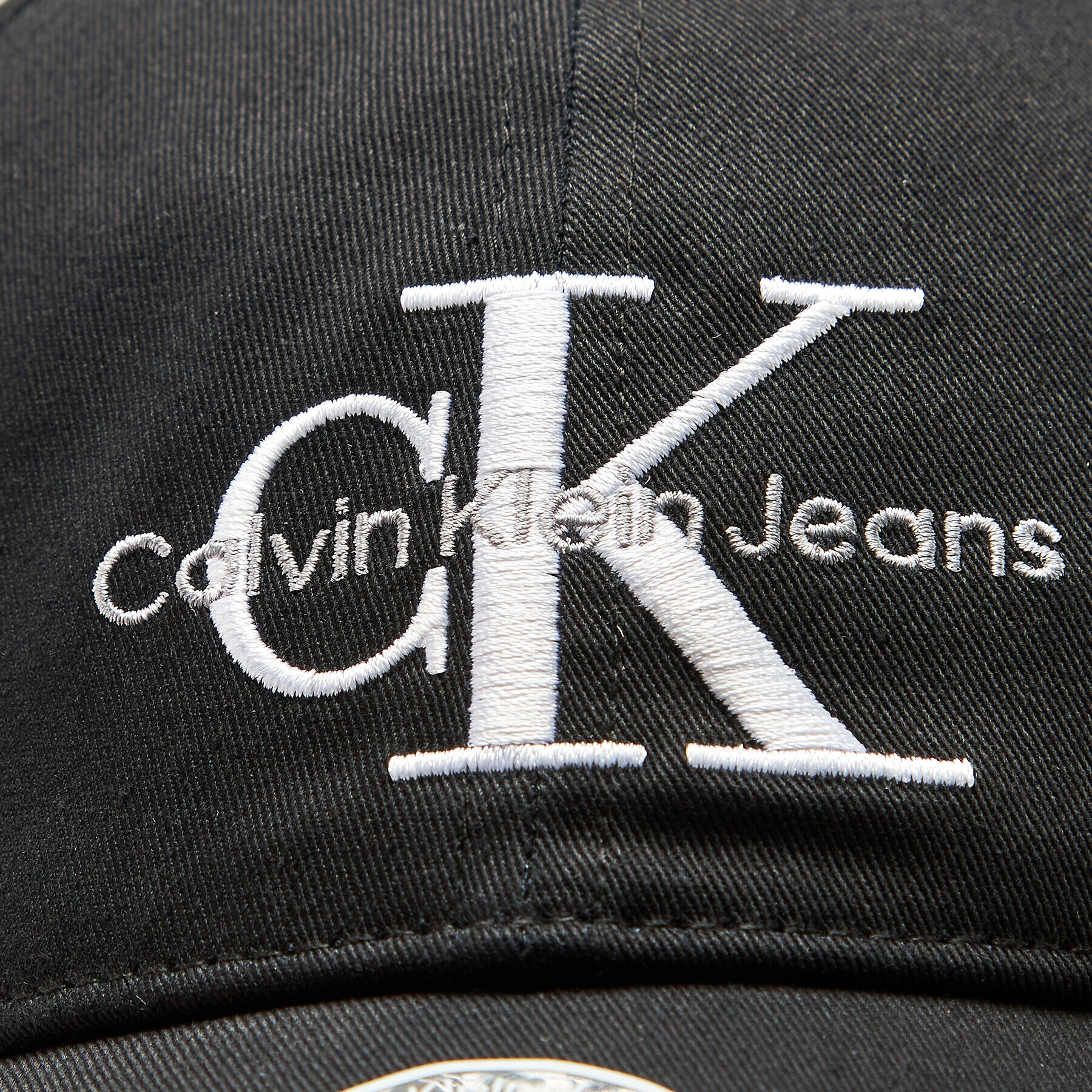 Calvin Klein Jeans Kapa s šiltom Monogram K50K510061 Črna - Pepit.si