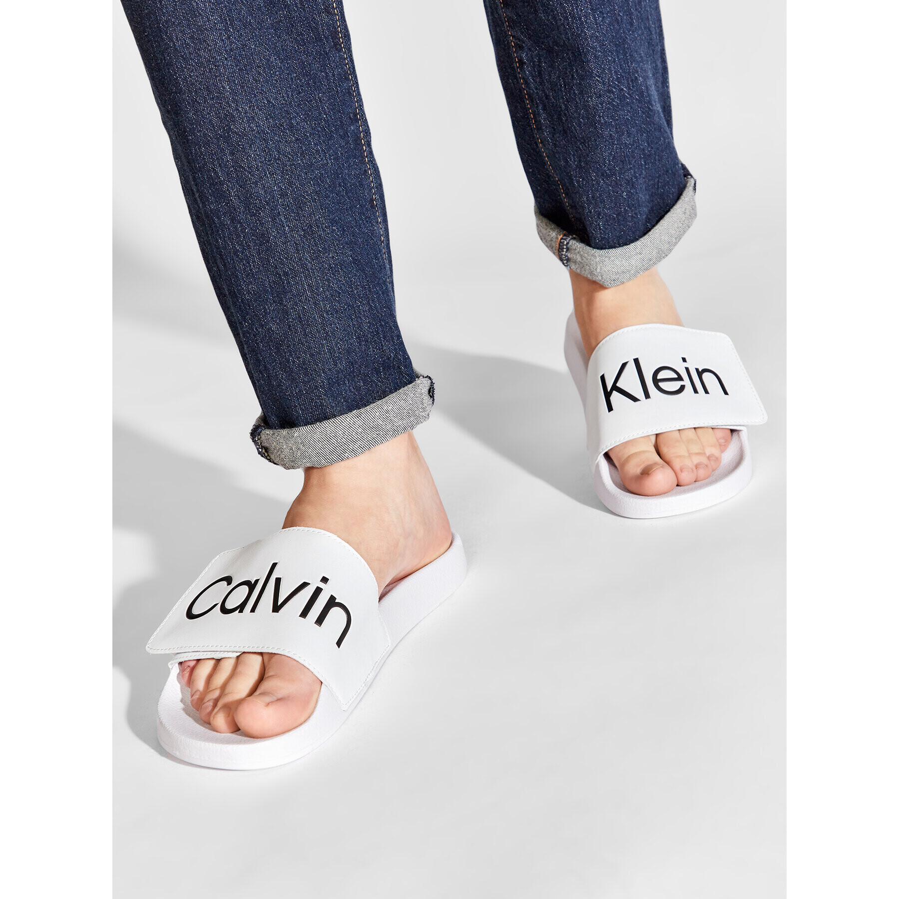 Calvin Klein Jeans Natikači Pool Slide Adj HM0HM00454 Bela - Pepit.si