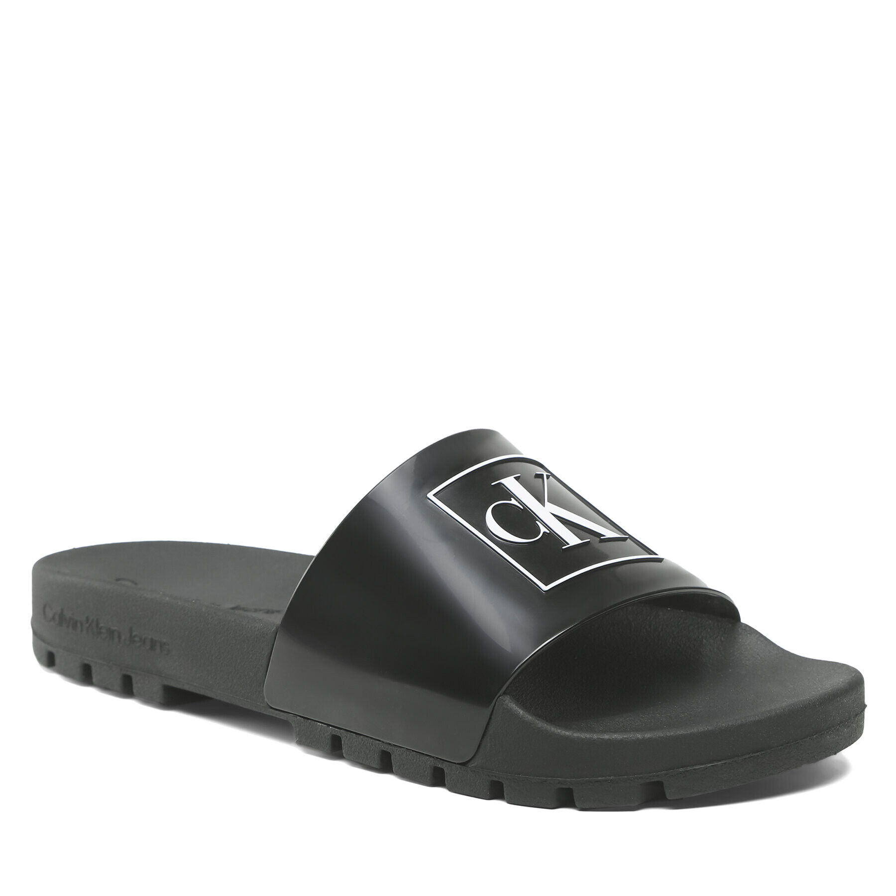 Calvin Klein Jeans Natikači Truck Slide Monogram Rubber M YM0YM00591 Črna - Pepit.si