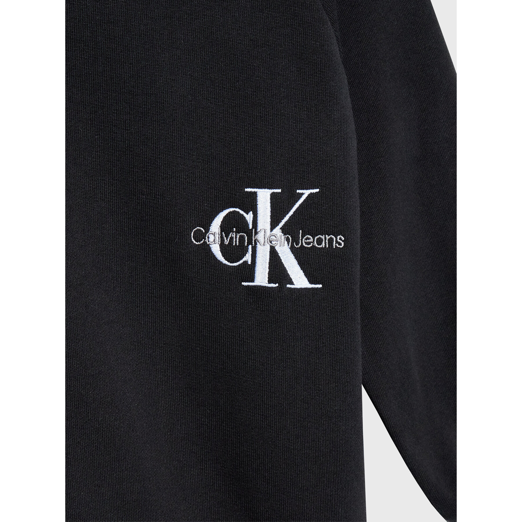 Calvin Klein Jeans Pletena obleka Monogram Off Placed IG0IG01567 Črna Regular Fit - Pepit.si