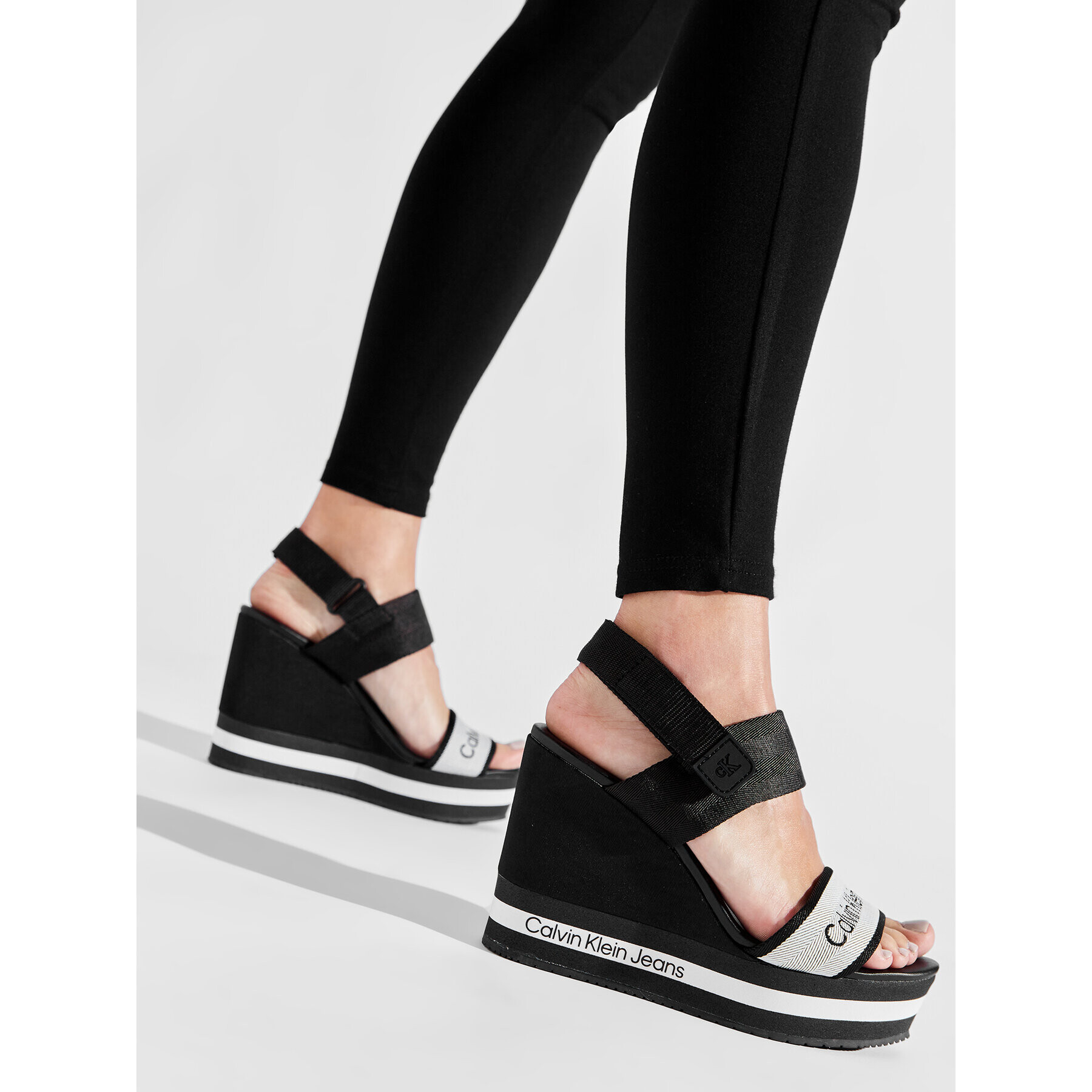 Calvin Klein Jeans Sandali Wedge Sandal YW0YW00669 Pisana - Pepit.si