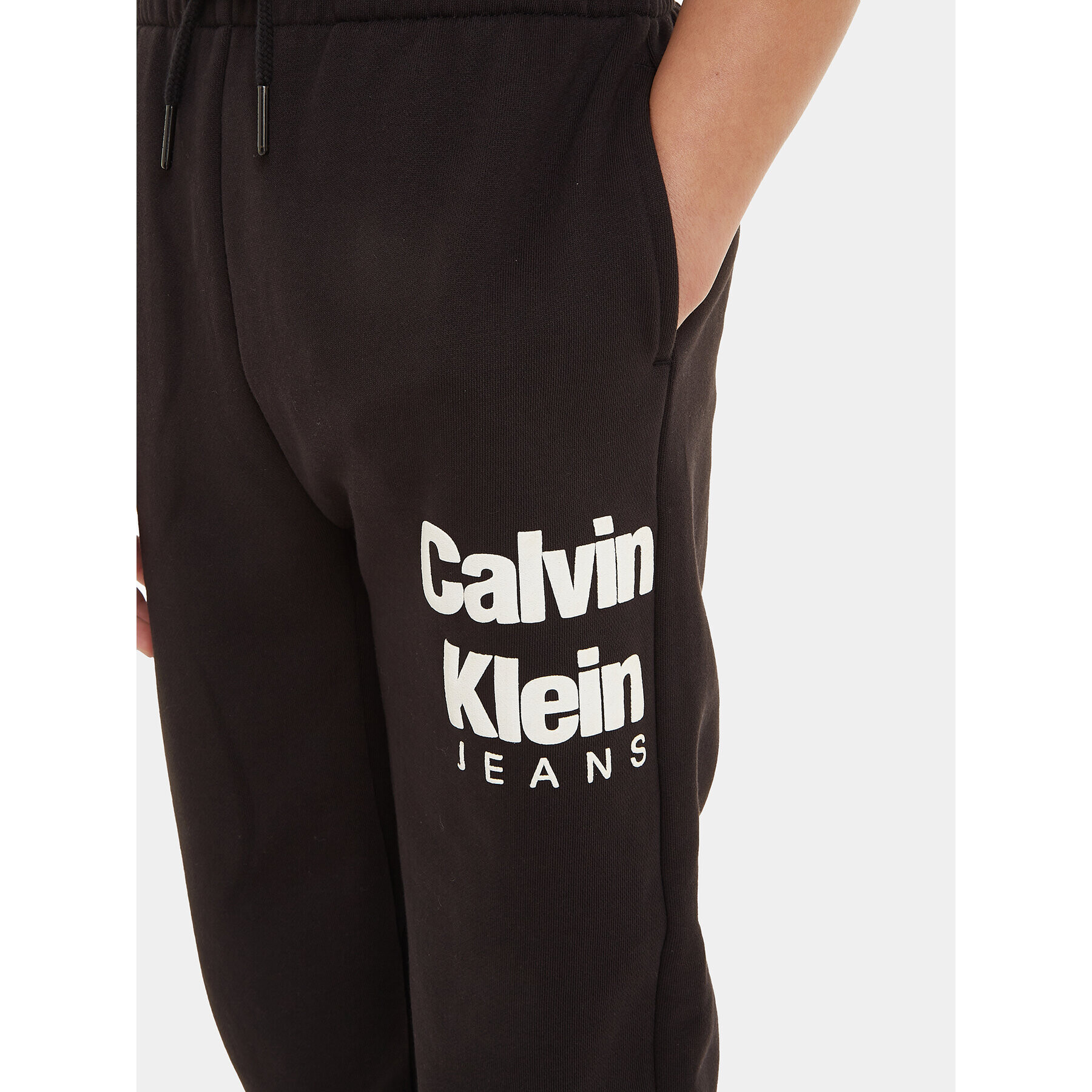 Calvin Klein Jeans Spodnji del trenirke IB0IB01816 Črna Regular Fit - Pepit.si