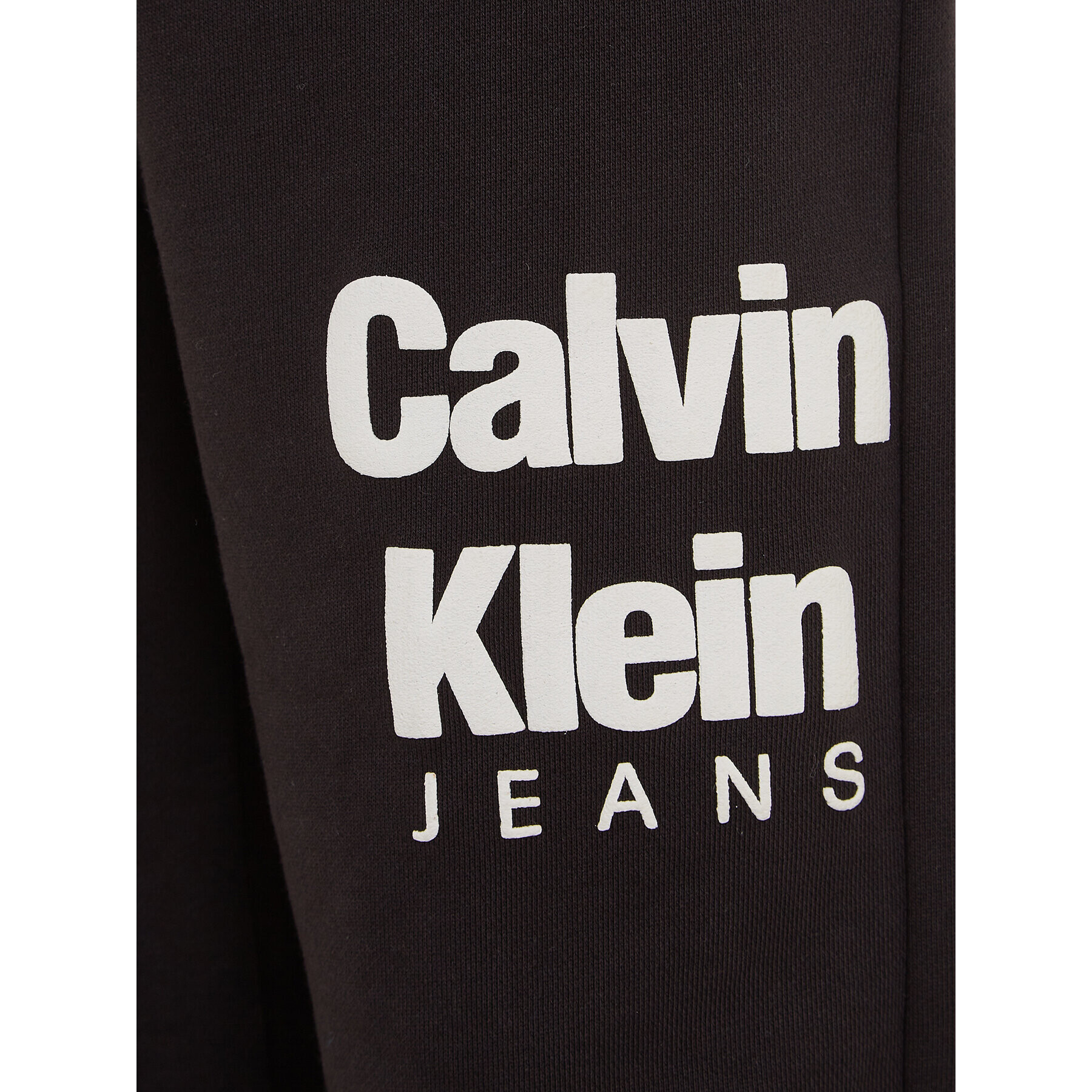 Calvin Klein Jeans Spodnji del trenirke IB0IB01816 Črna Regular Fit - Pepit.si