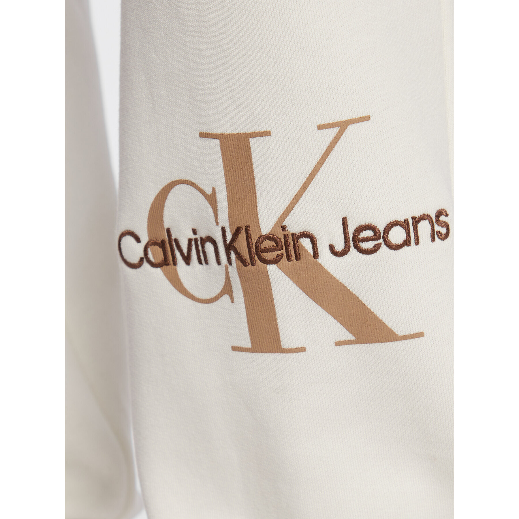 Calvin Klein Jeans Spodnji del trenirke J20J220265 Écru Relaxed Fit - Pepit.si