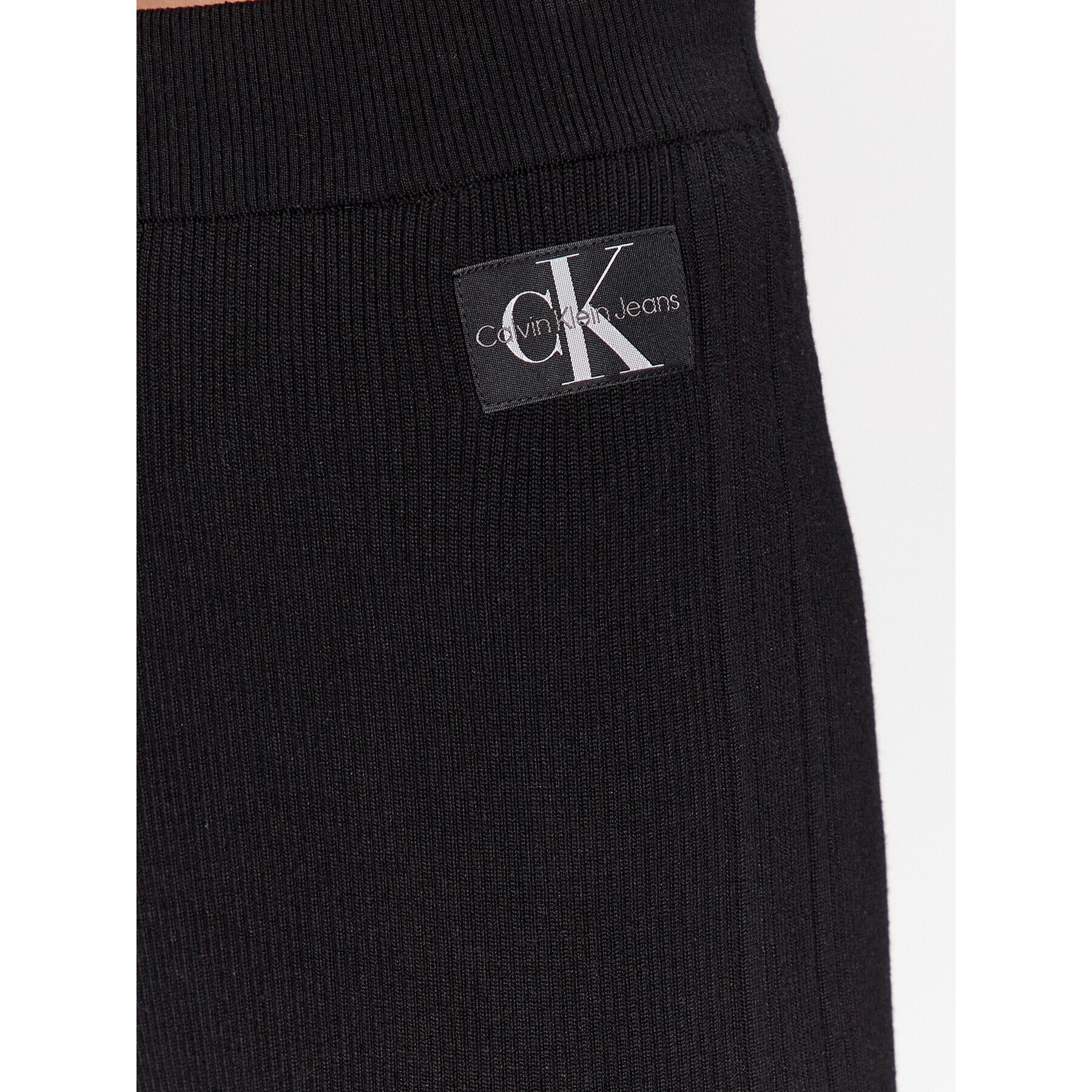 Calvin Klein Jeans Spodnji del trenirke J20J222114 Črna Relaxed Fit - Pepit.si