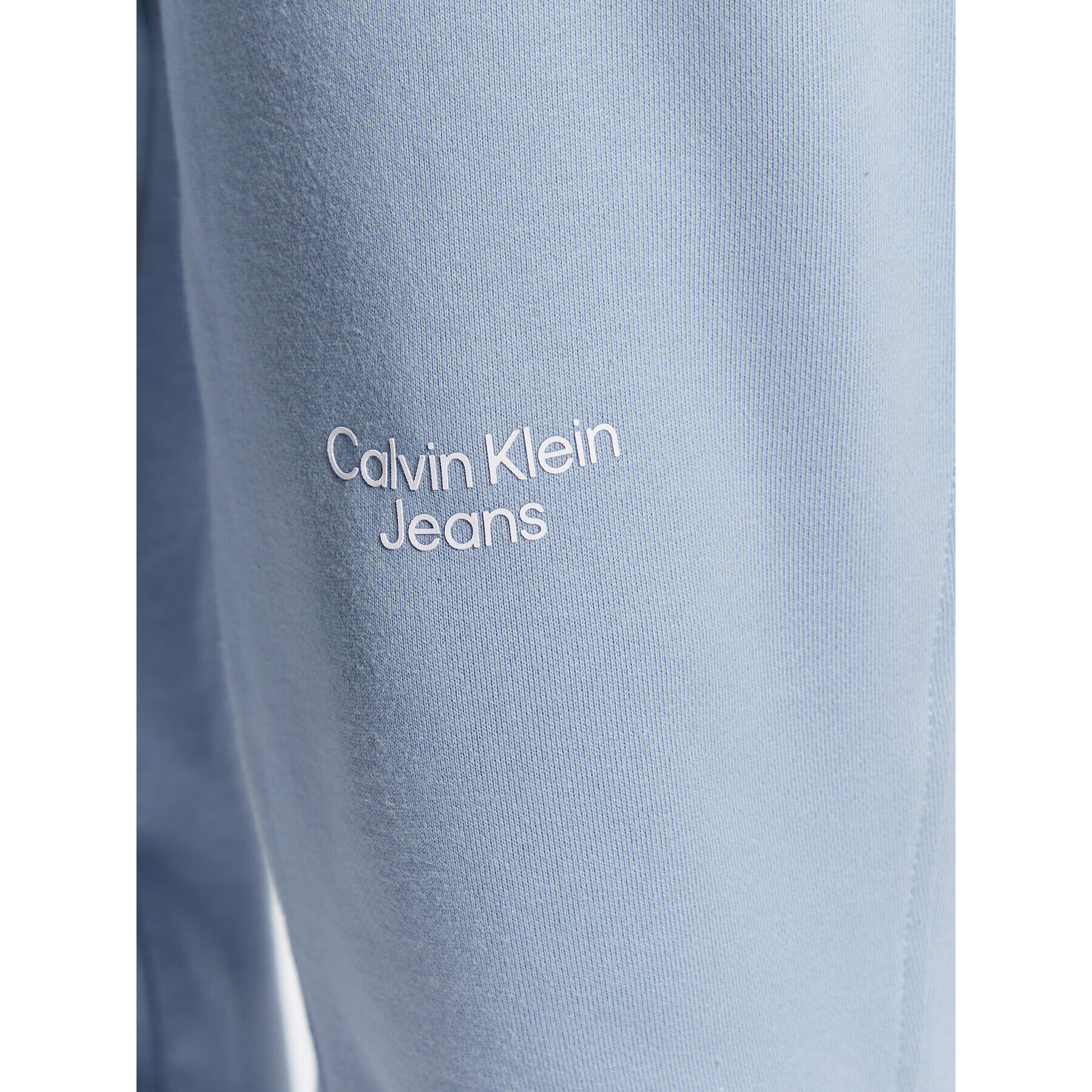 Calvin Klein Jeans Spodnji del trenirke J30J320590 Modra Regular Fit - Pepit.si