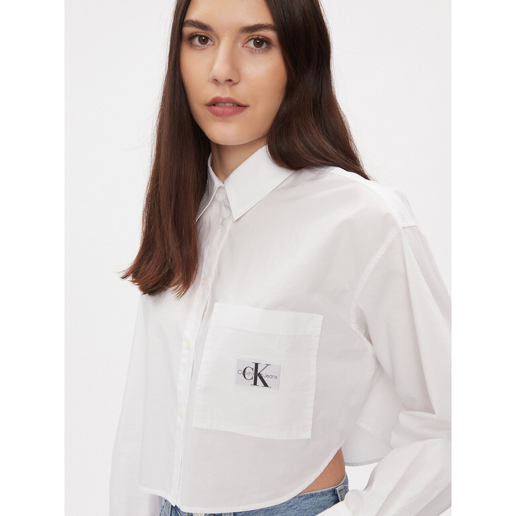 Calvin Klein Jeans Srajca J20J222614 Bela Cropped Fit - Pepit.si