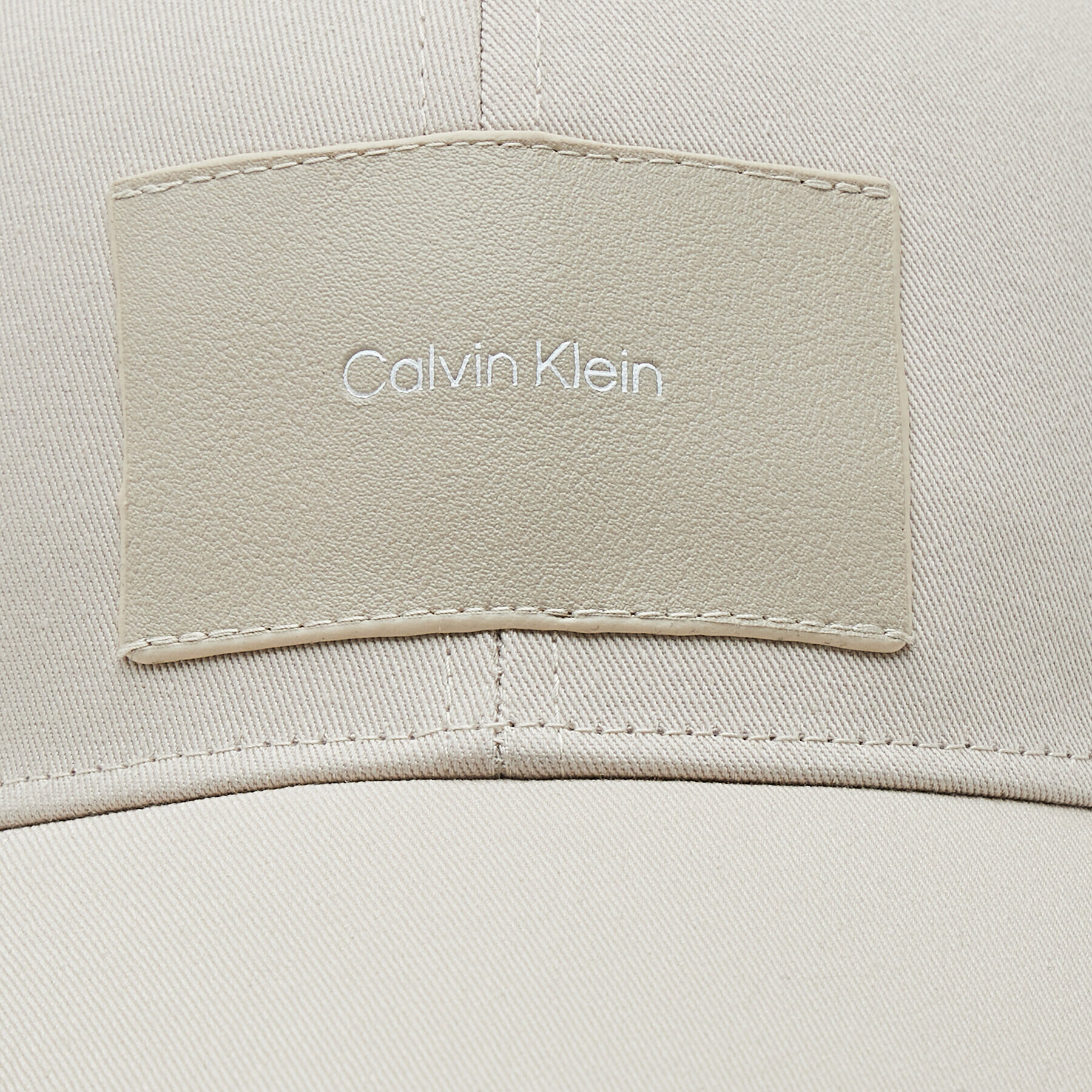 Calvin Klein Kapa s šiltom K50K509927 Bež - Pepit.si