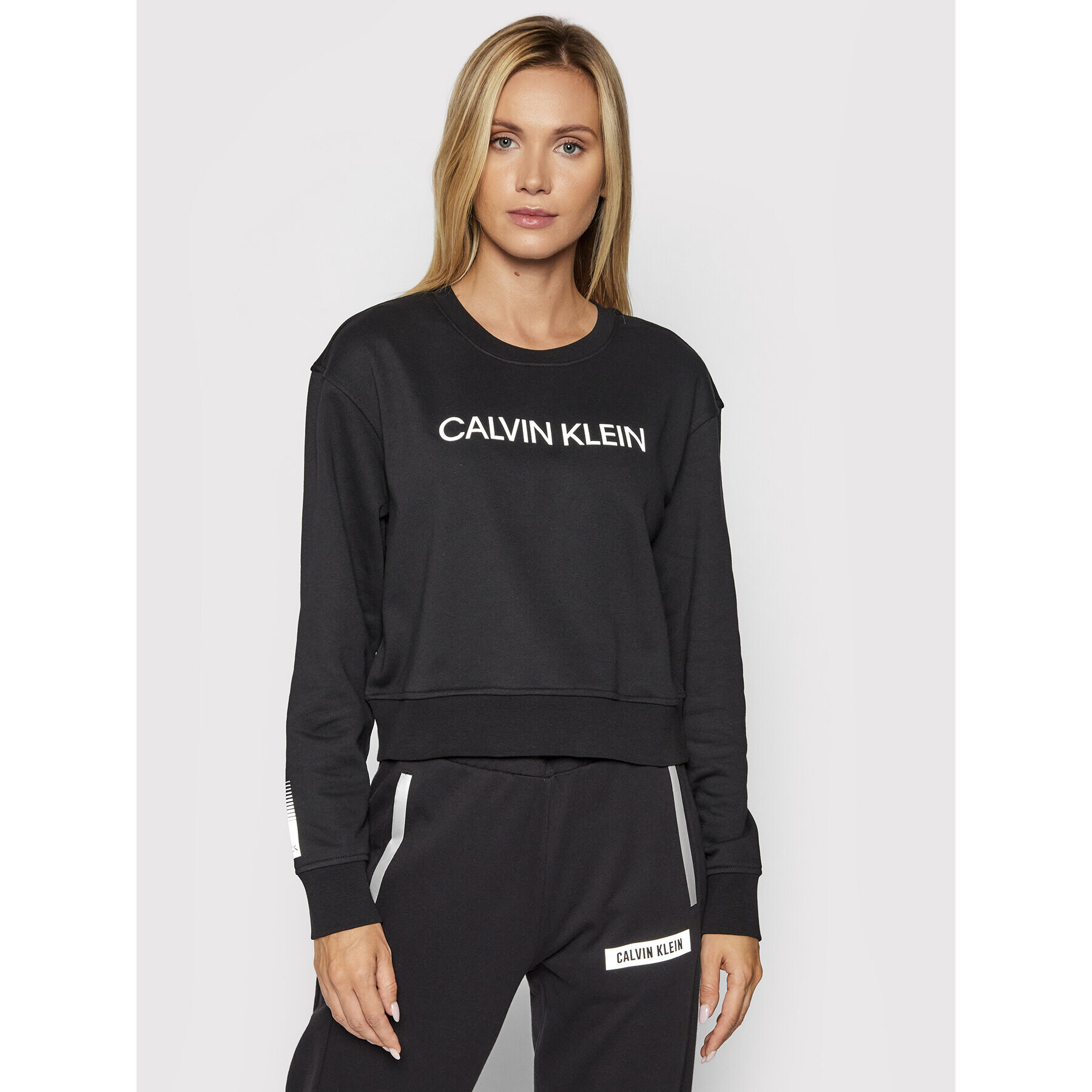 Calvin Klein Performance Jopa 00GWF1W312 Črna Cropped Fit - Pepit.si