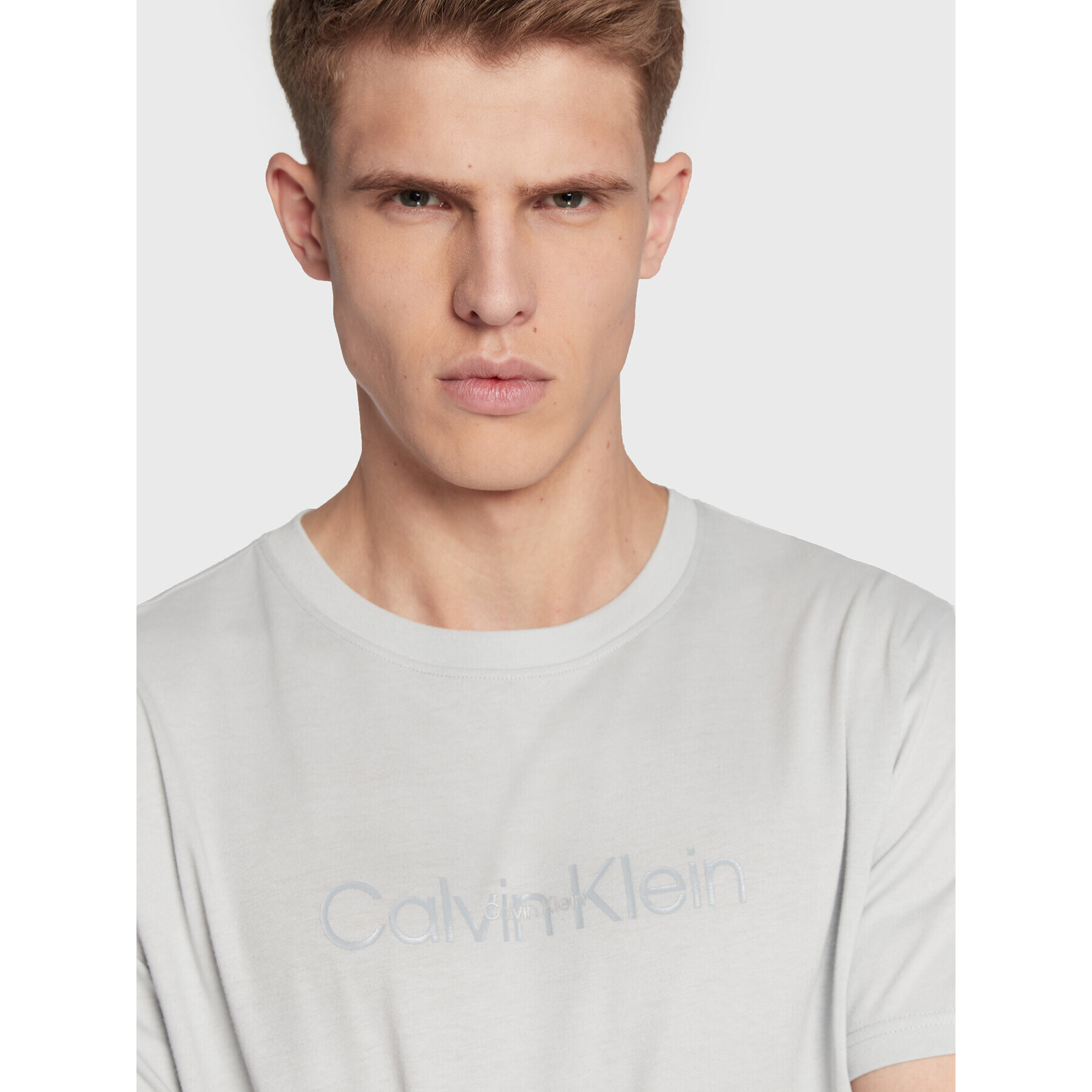 Calvin Klein Performance Majica 00GMF2K140 Siva Regular Fit - Pepit.si