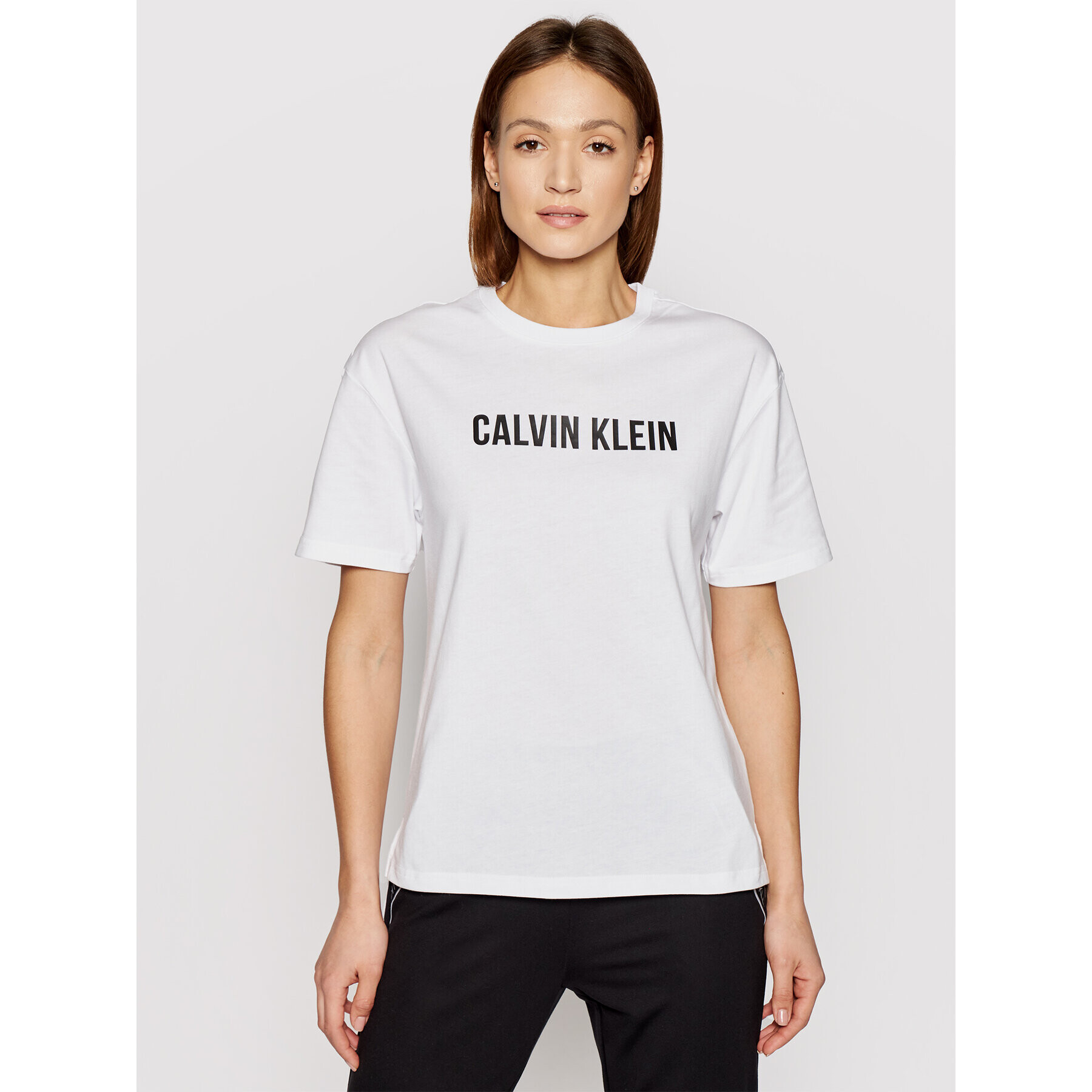 Calvin Klein Performance Majica Logo Boyfriend 00GWS1K109 Bela Relaxed Fit - Pepit.si