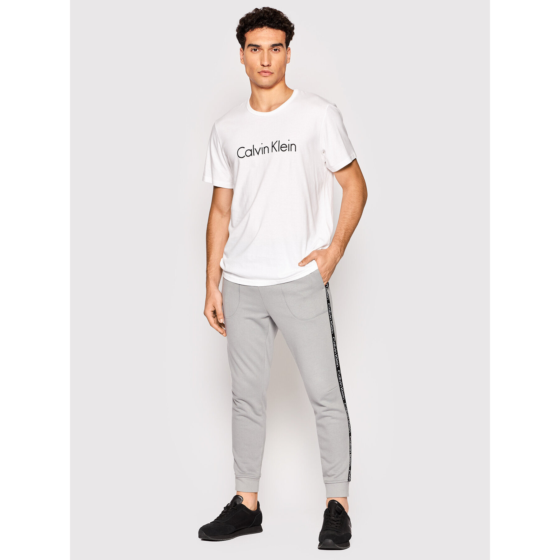 Calvin Klein Performance Spodnji del trenirke 00GMS2P600 Siva Regular Fit - Pepit.si