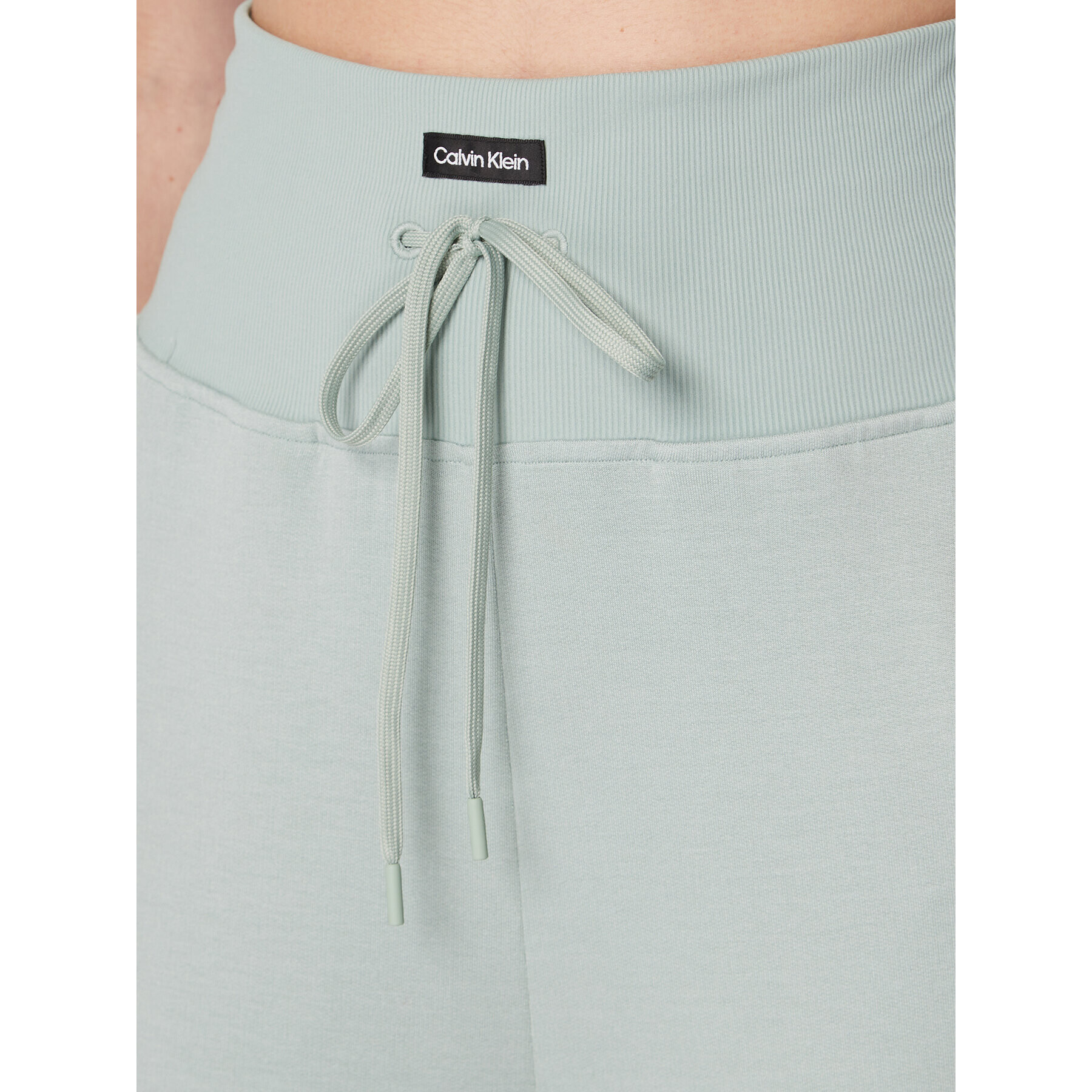 Calvin Klein Performance Spodnji del trenirke 00GWF2P611 Zelena Slim Fit - Pepit.si