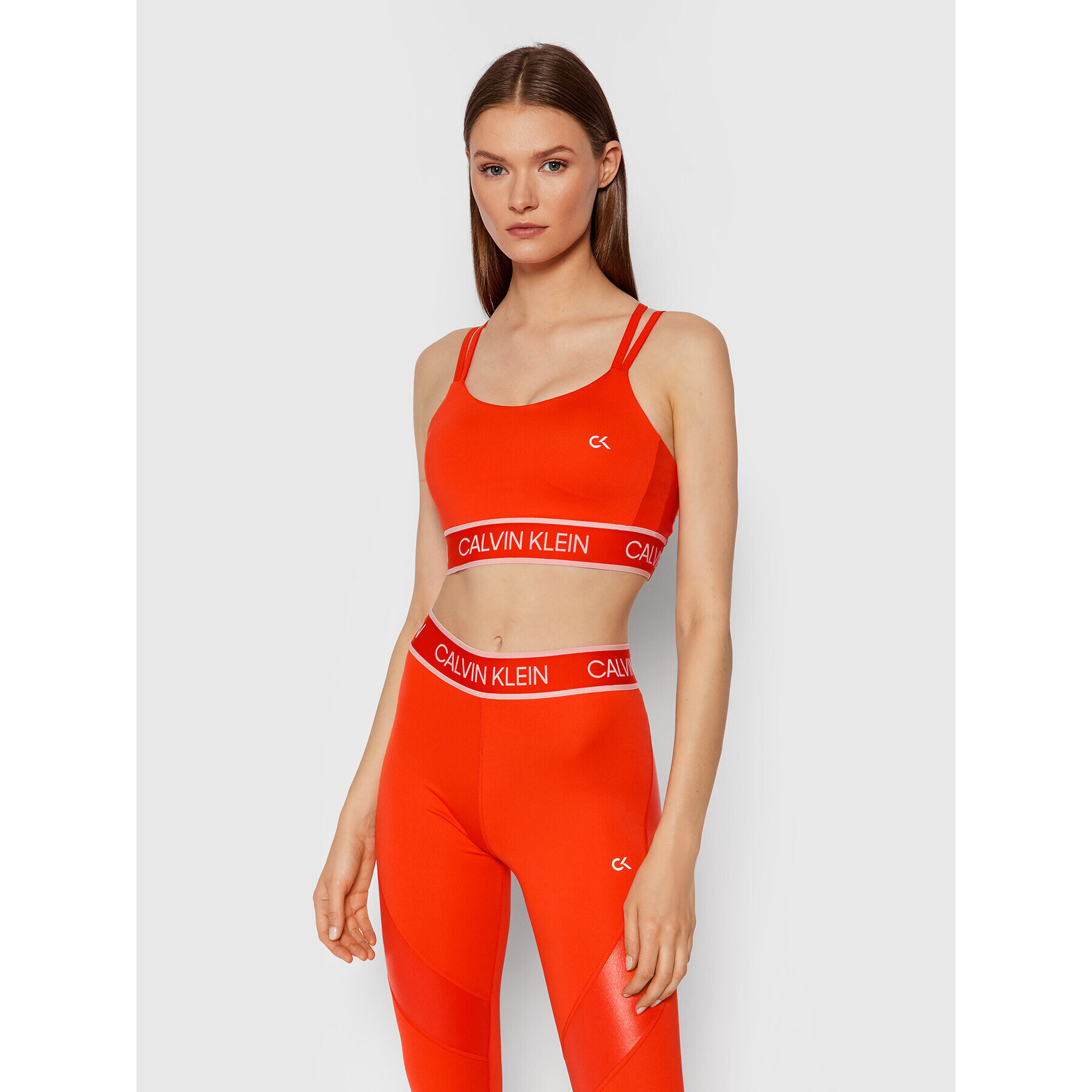 Calvin Klein Performance Špotni nedrček Low Support 00GWT1K125 Oranžna - Pepit.si