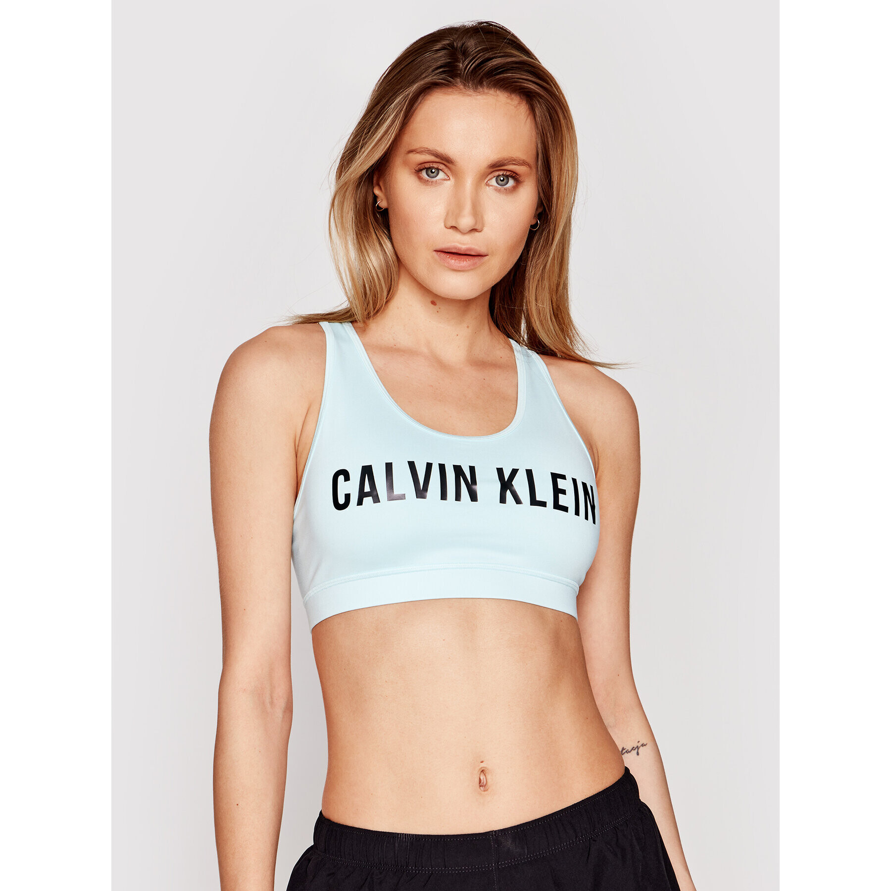 Calvin Klein Performance Špotni nedrček Medium Support 00GWF0K157 Modra - Pepit.si