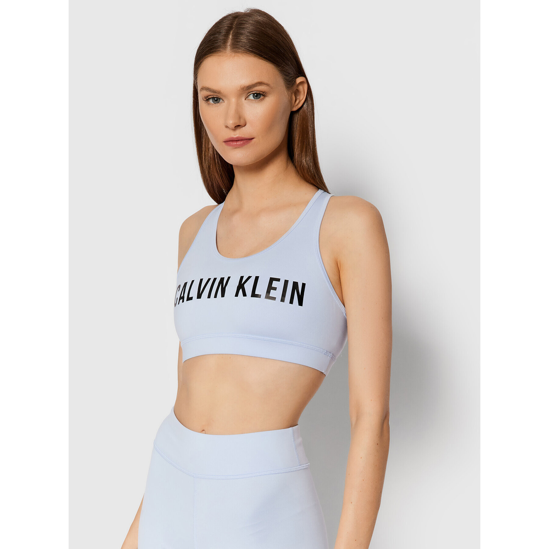 Calvin Klein Performance Špotni nedrček Medium Support 00GWF0K157 Modra - Pepit.si