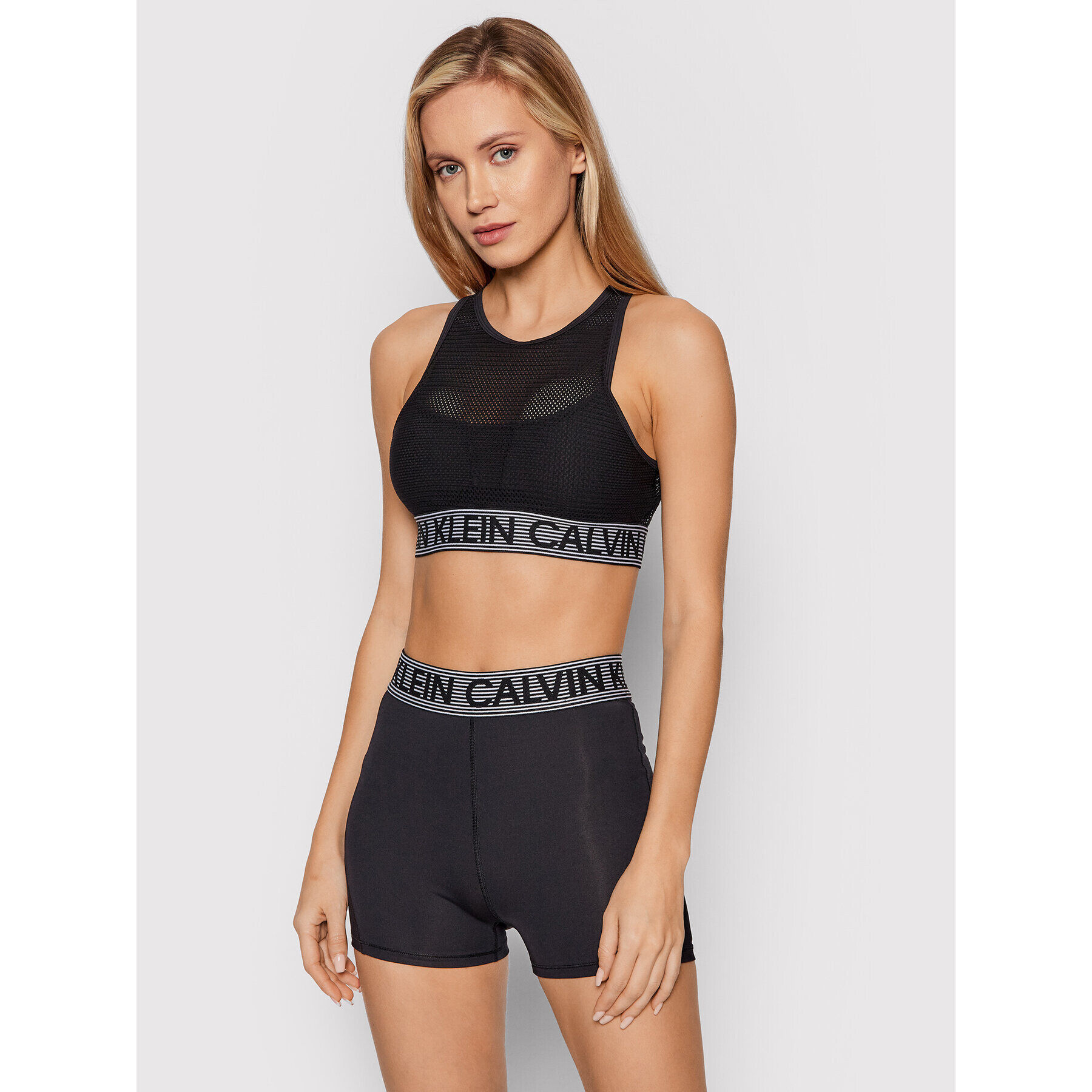 Calvin Klein Performance Špotni nedrček Medium Support Sports 00GWF1K108 Črna - Pepit.si