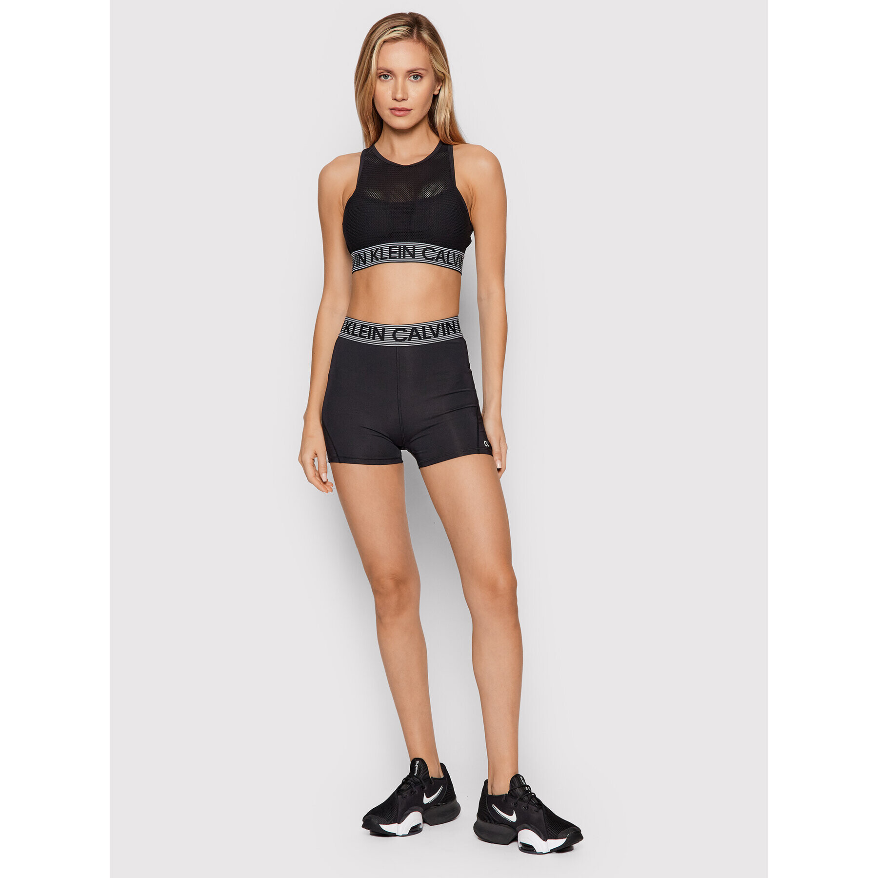 Calvin Klein Performance Špotni nedrček Medium Support Sports 00GWF1K108 Črna - Pepit.si