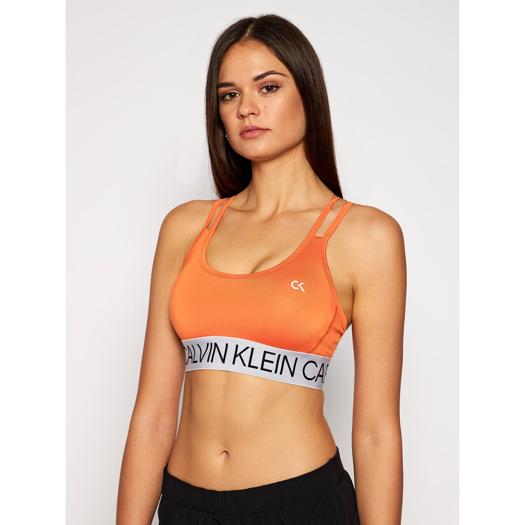 Calvin Klein Performance Top nedrček Low 00GWF0K101 Oranžna - Pepit.si