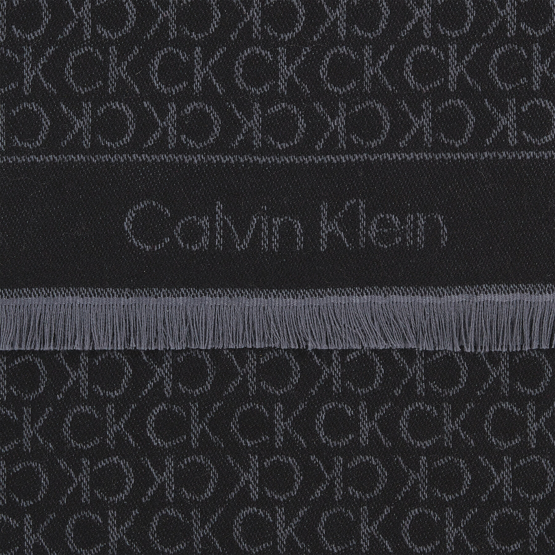 Calvin Klein Ruta Monogram Jacquard Scarf 40X180 K60K611116 Črna - Pepit.si