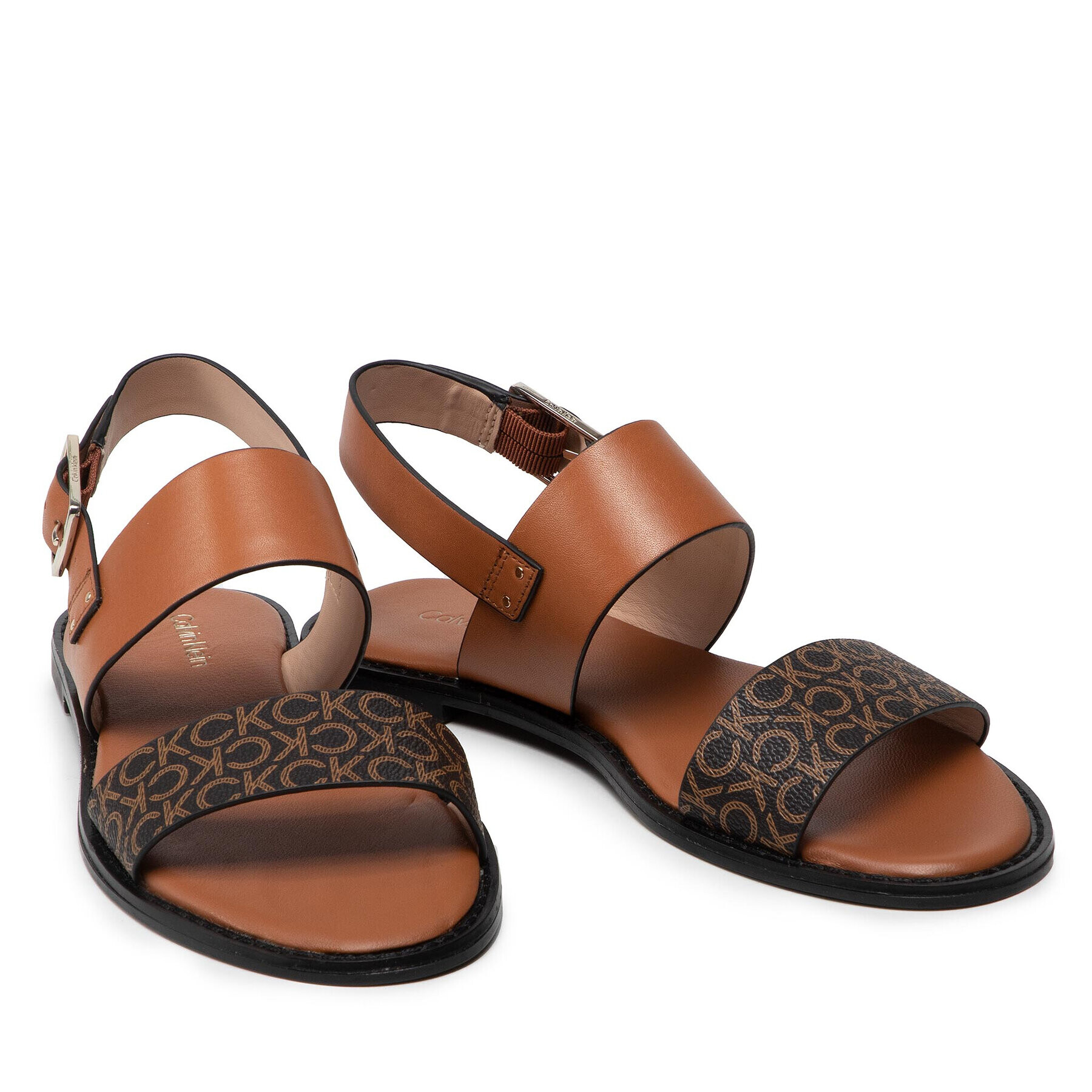 Calvin Klein Sandali Alomnd Flat Sandal Mono Mix HW0HW00821 Rjava - Pepit.si