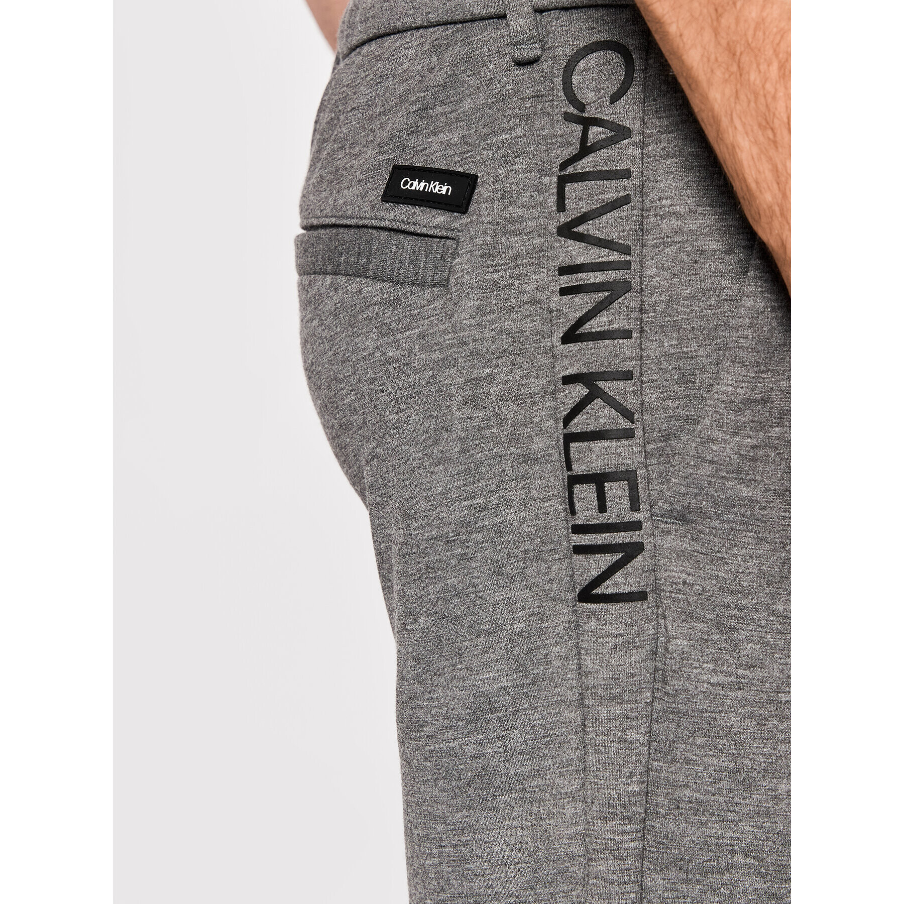 Calvin Klein Spodnji del trenirke Comfort K10K107498 Siva Regular Fit - Pepit.si