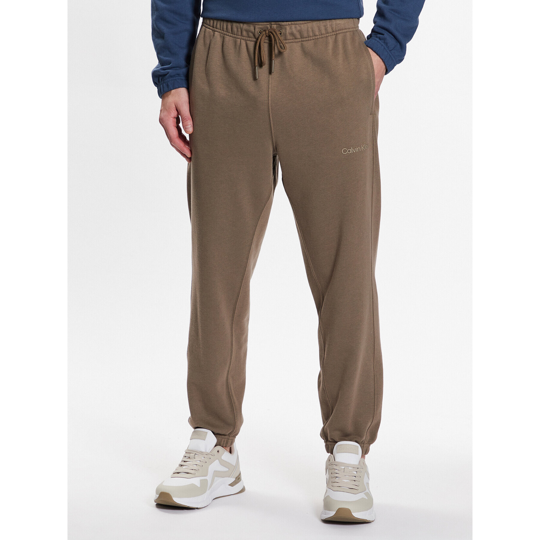 Calvin Klein Performance Spodnji del trenirke Knitt Pant 00GMS3P604 Khaki Relaxed Fit - Pepit.si